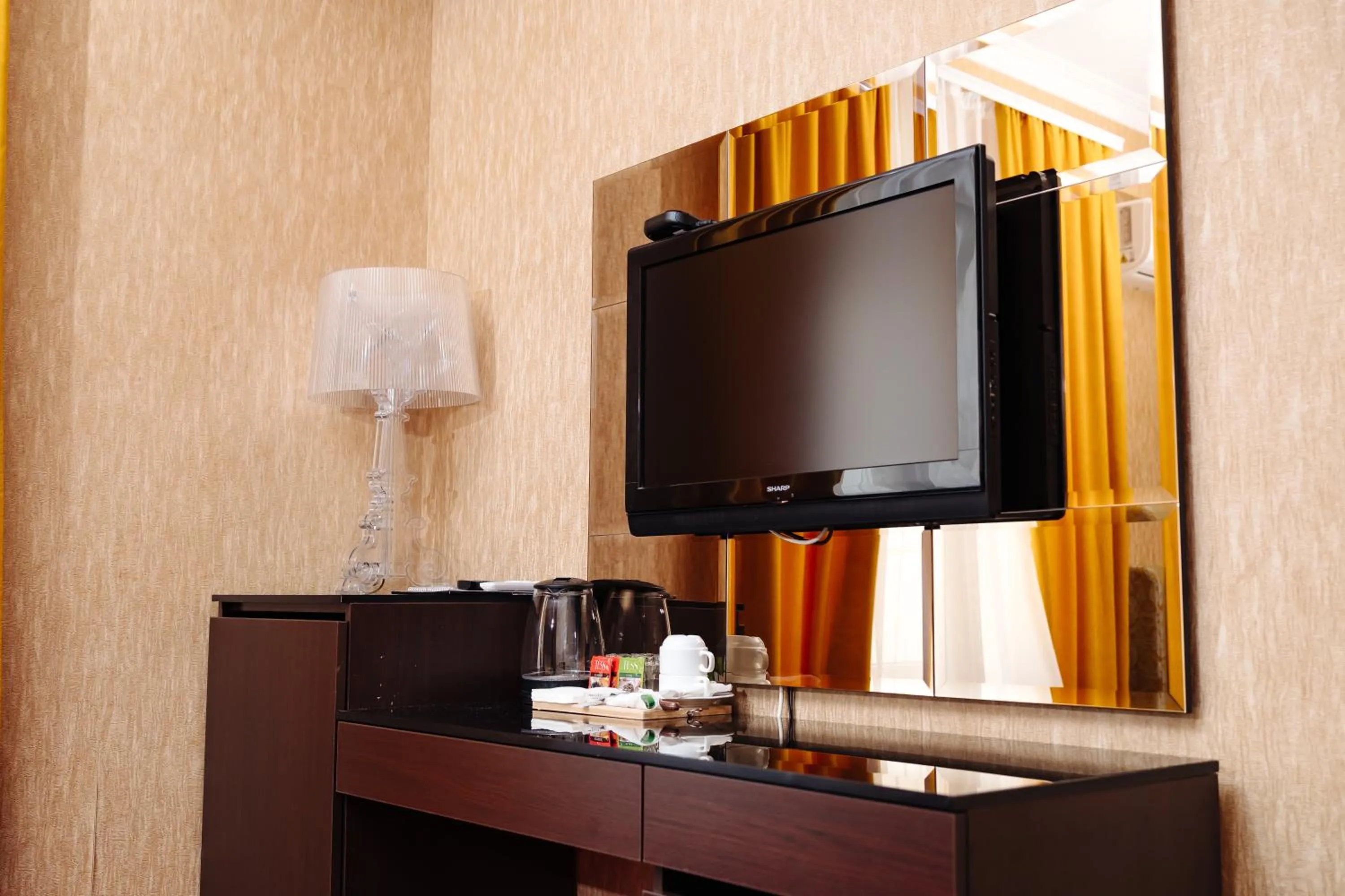 Bed in Maxim Pasha Hotel