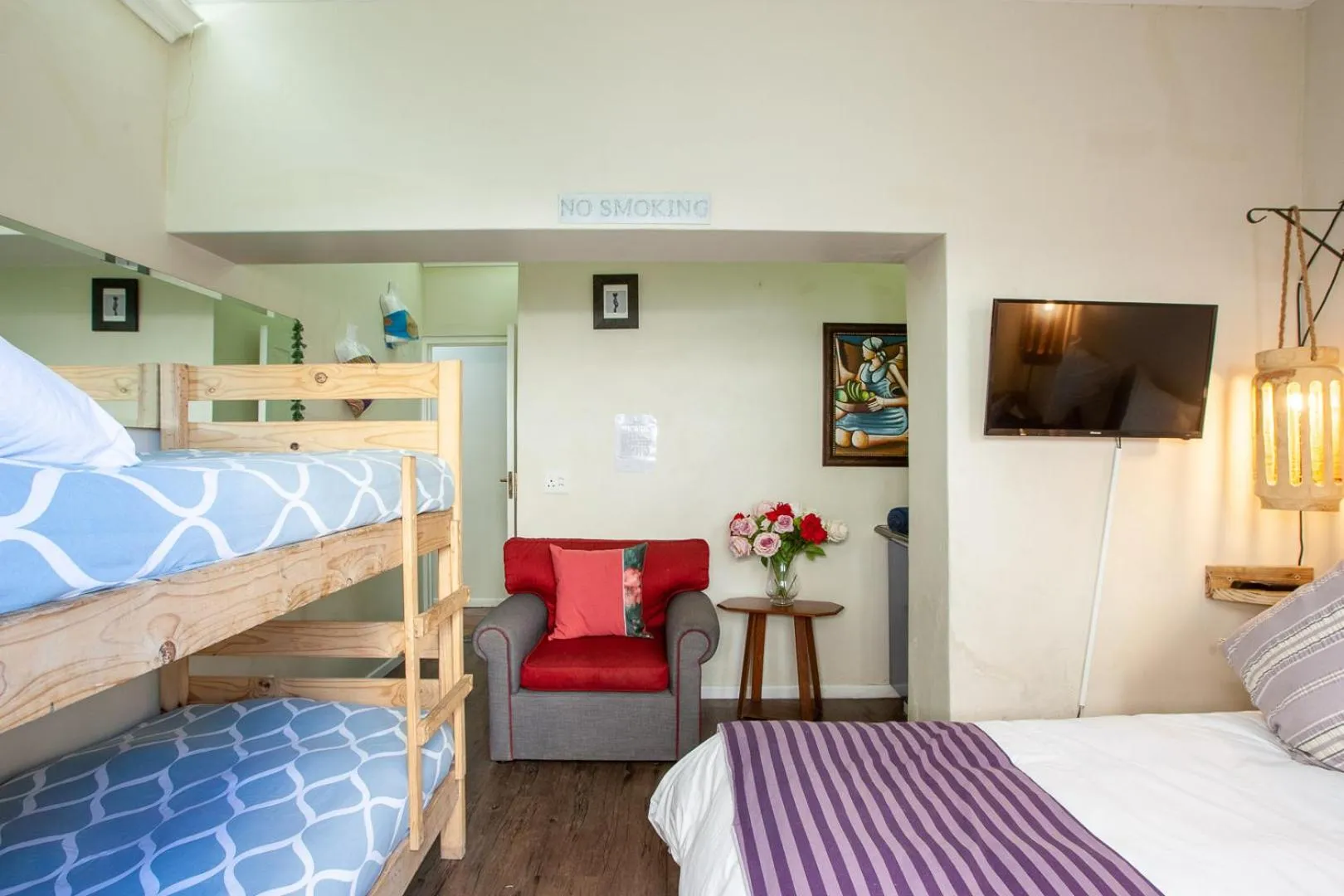 Photo of the whole room, Bed in Bedrock Guest Studios