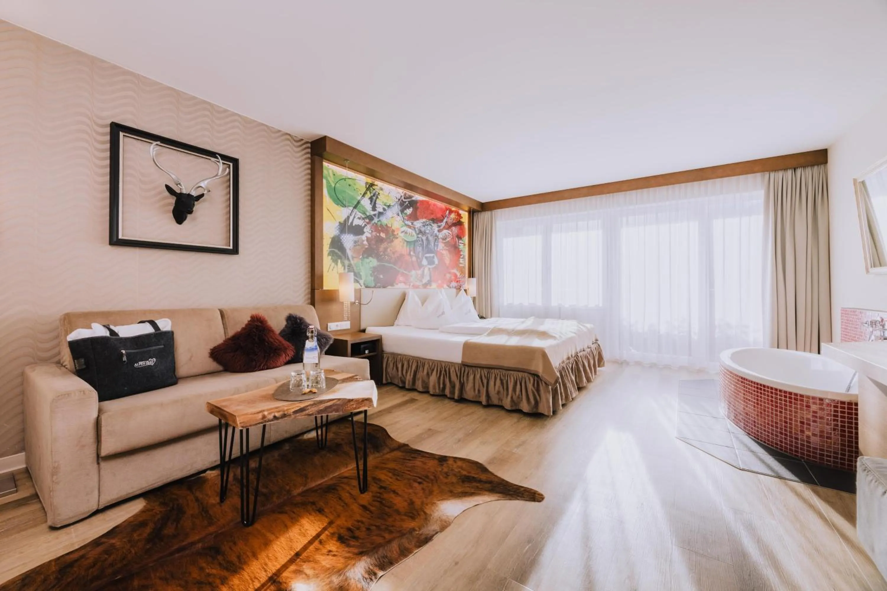 Photo of the whole room, Bed in Alpen-Herz Romantik & Spa - Adults Only