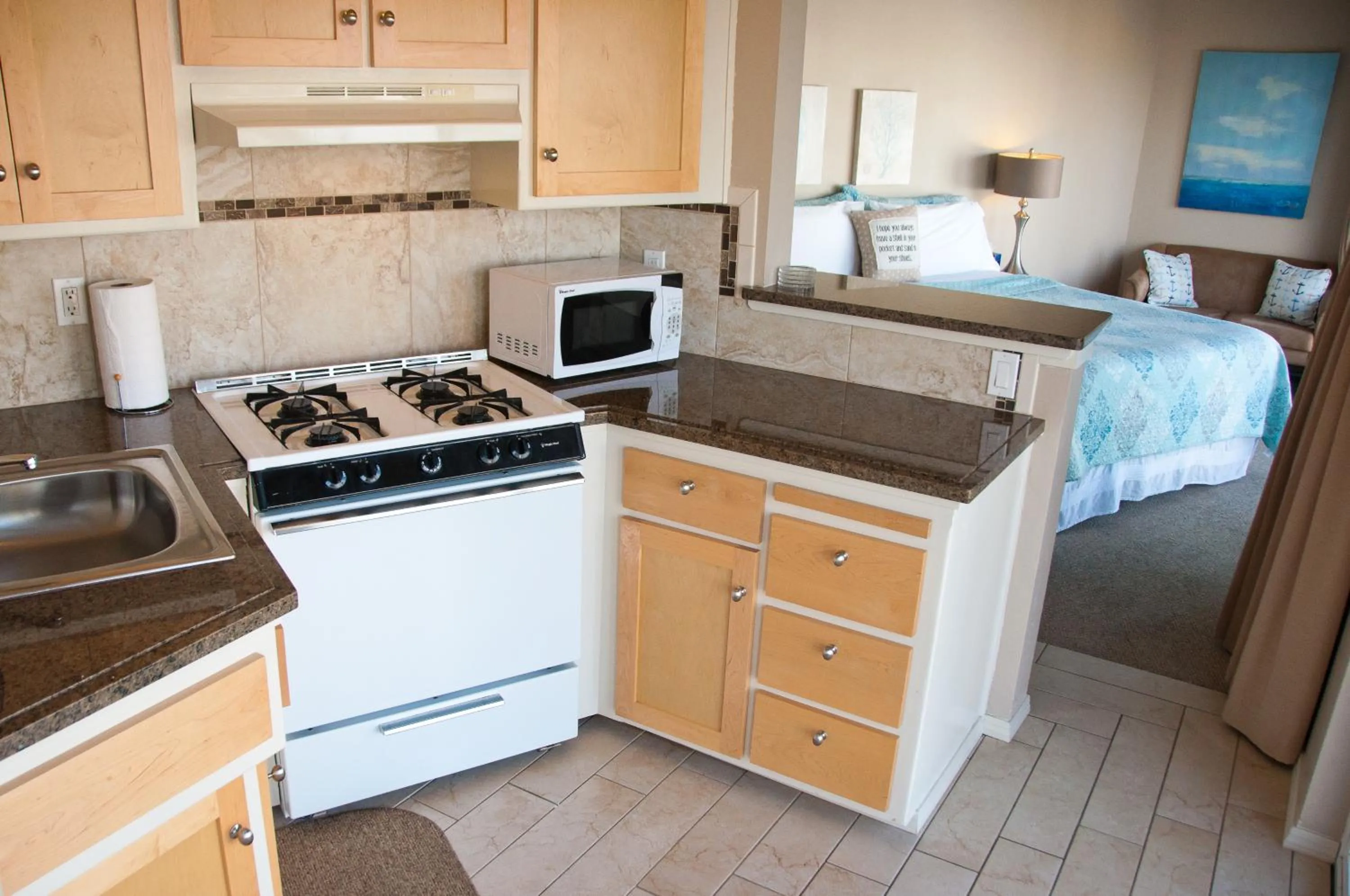 Bed in Capitola Beach Suites