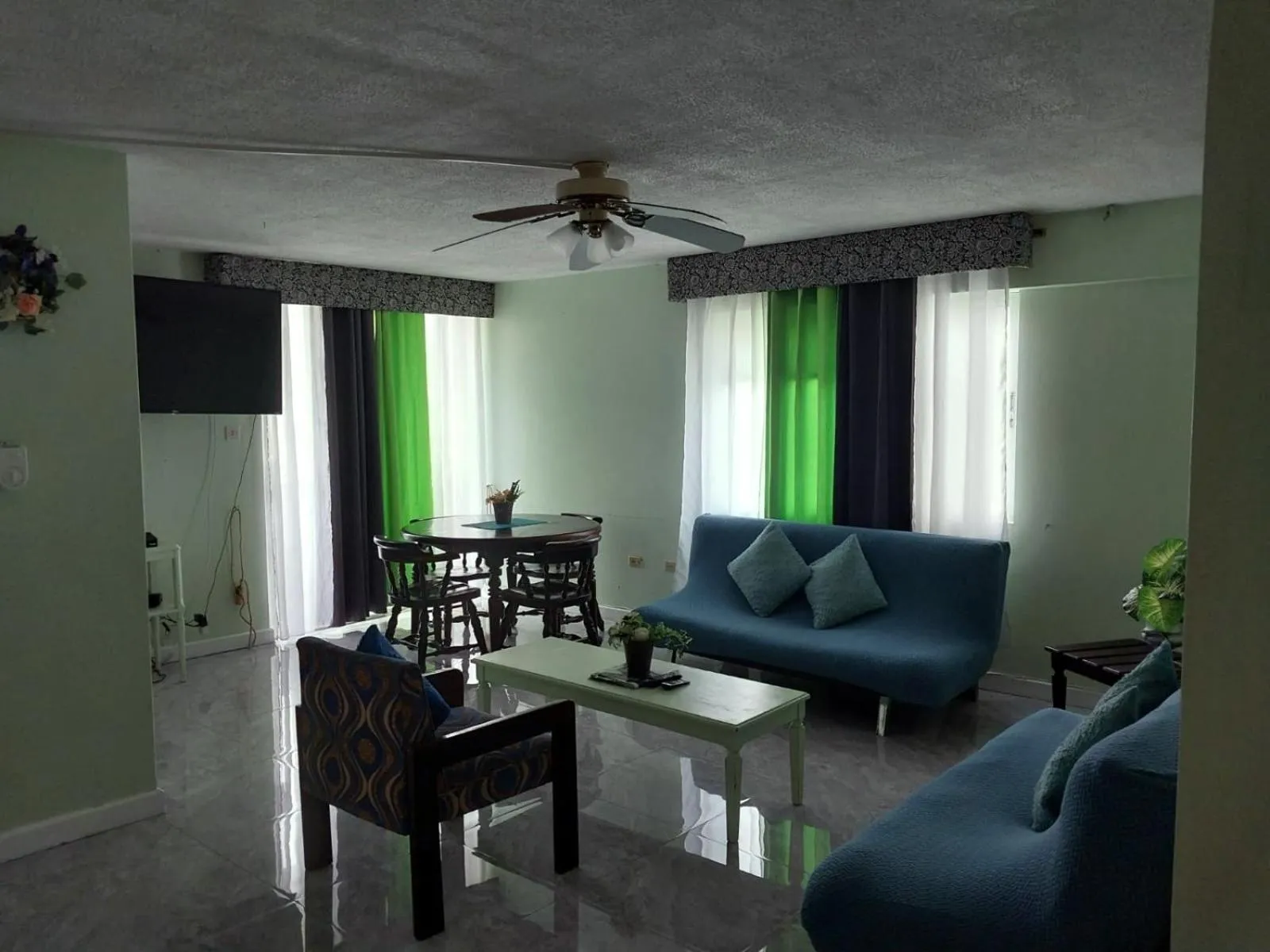 Living room in Beach-side condos at Turtle Beach Towers