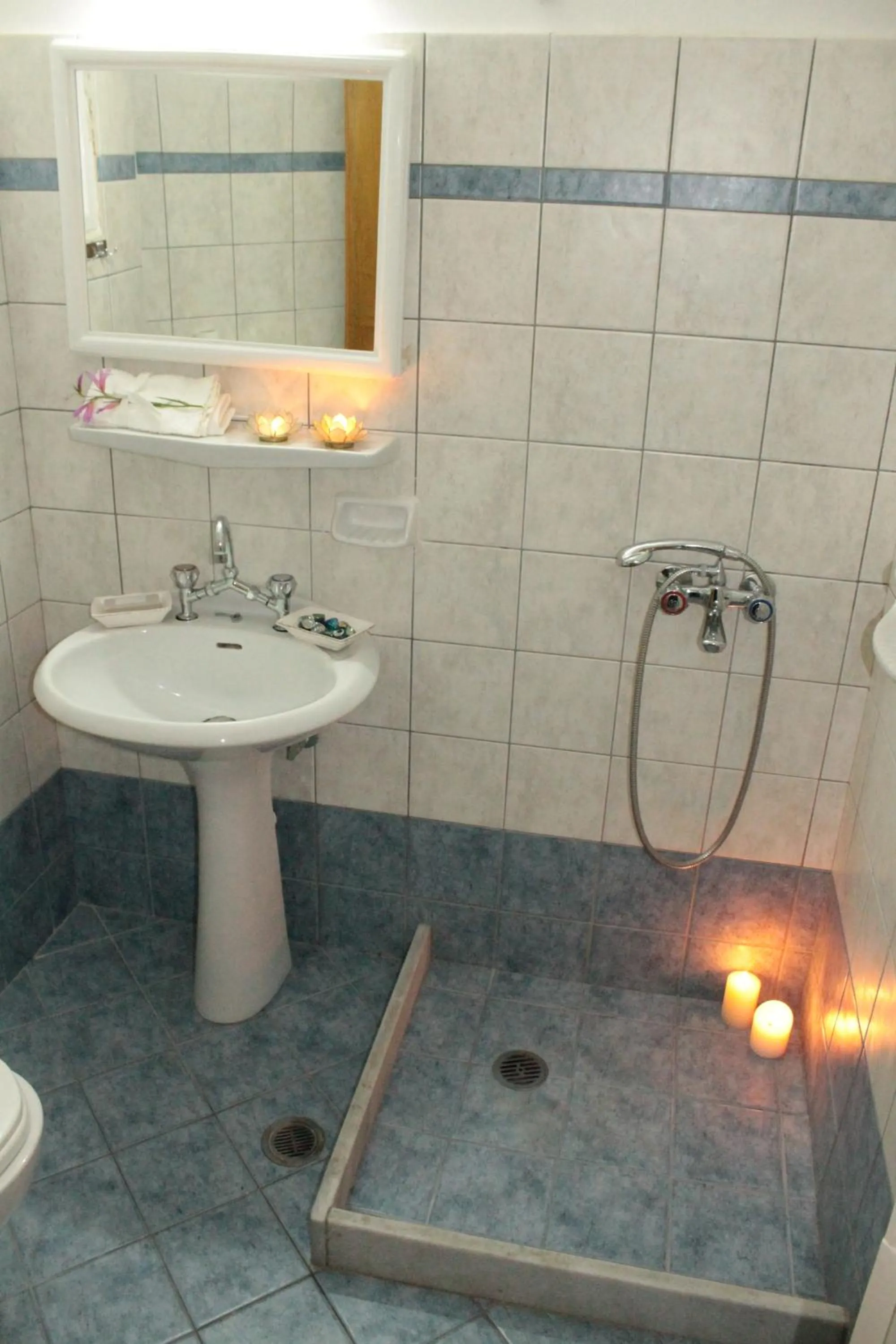 Bathroom in Melissa Apartments, Studios & Suites