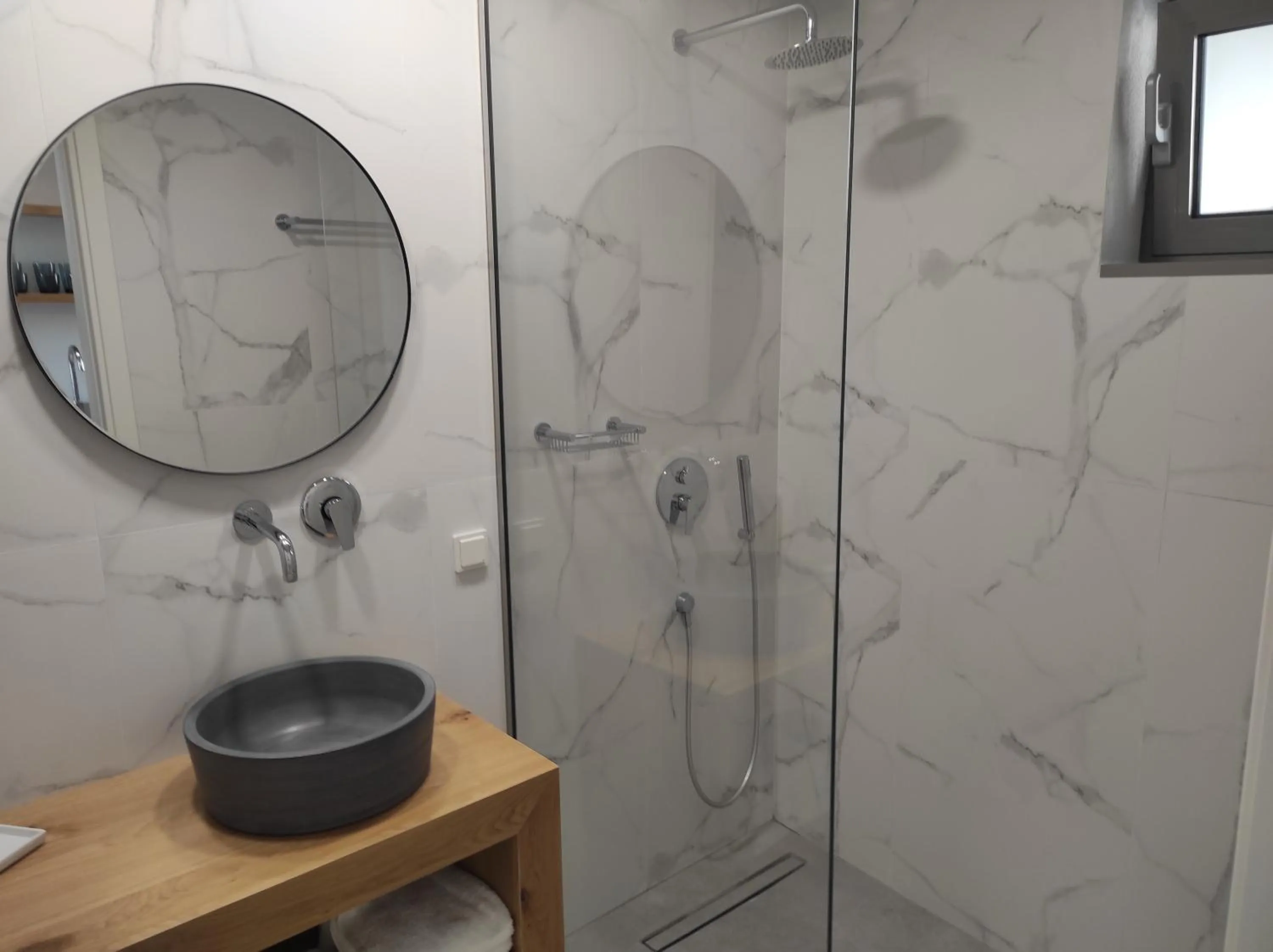 Bathroom in Melissa Apartments, Studios & Suites