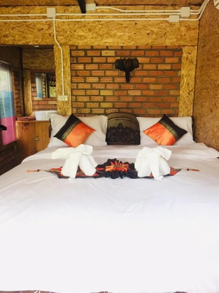 Bed in Mook Tamarind Resort