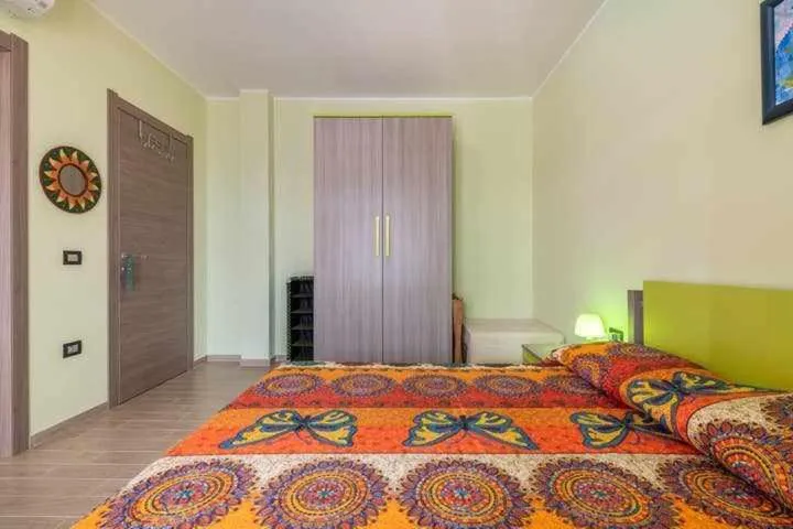 Bed in L'arcobaleno di Chia CIN IT11101CE
