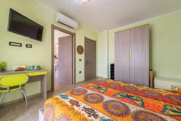 Bed in L'arcobaleno di Chia CIN IT11101CE