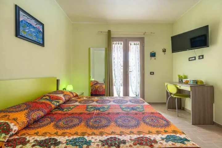 Bed in L'arcobaleno di Chia CIN IT11101CE