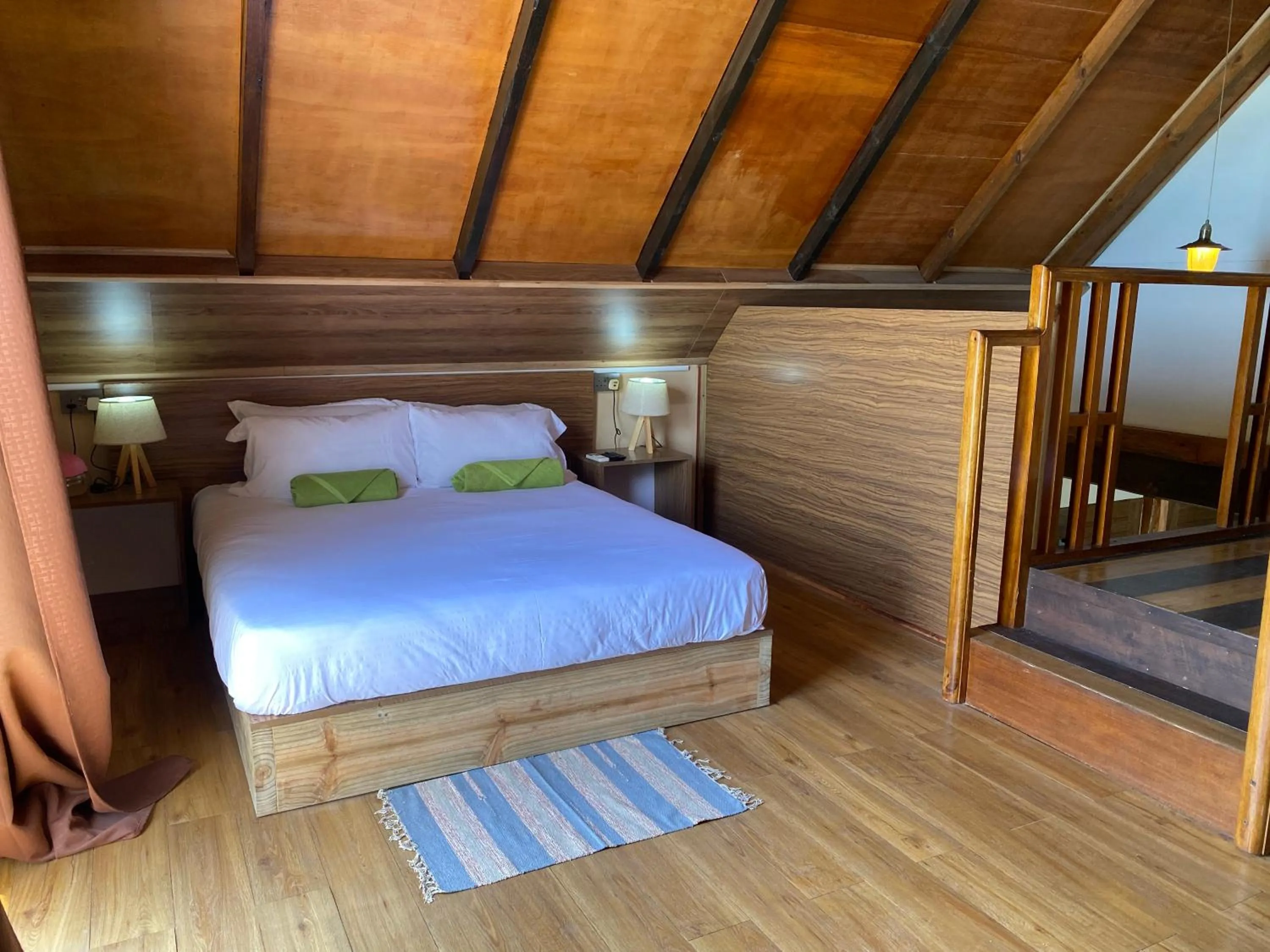 Bed in Mouggae Blues Villas
