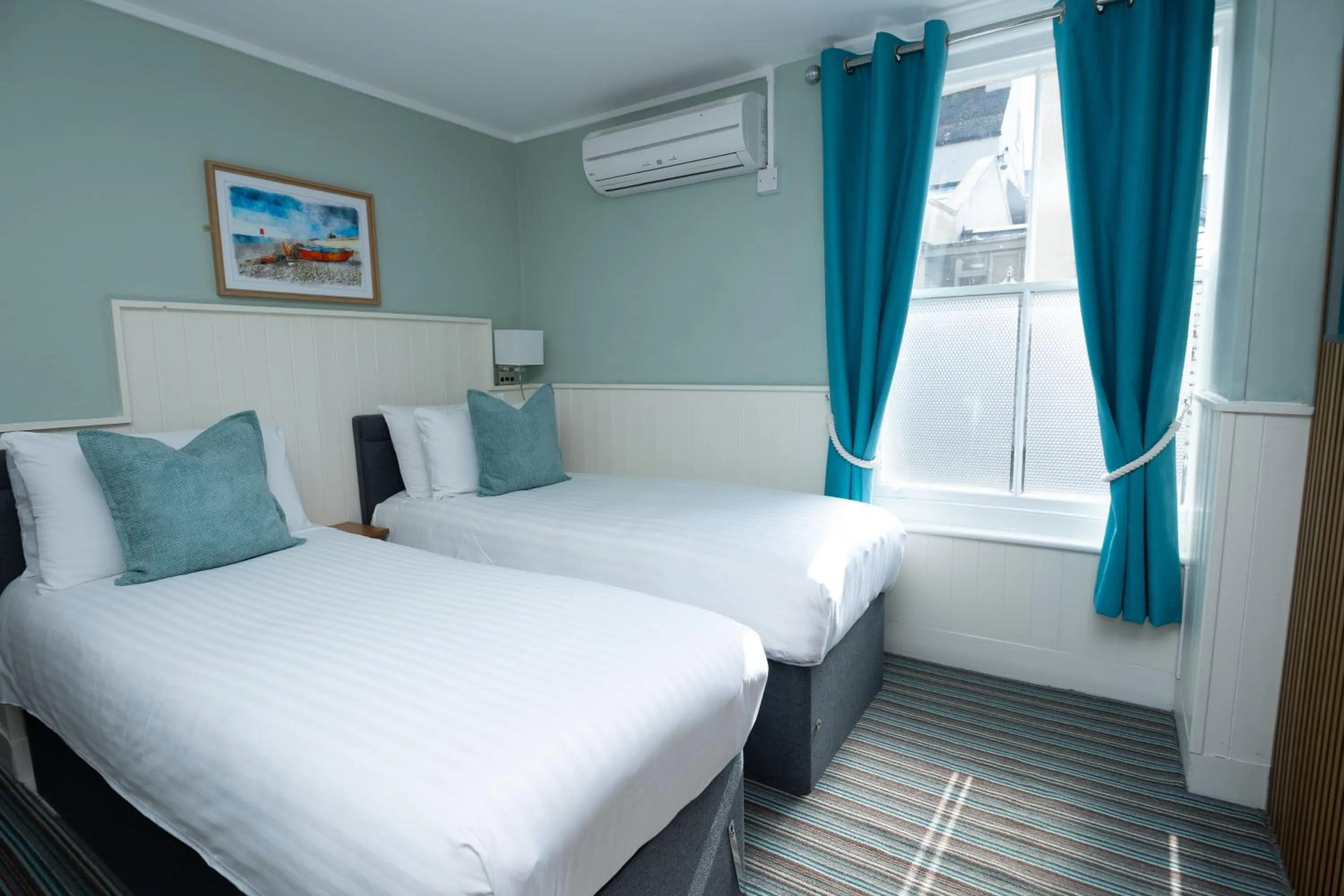 Bed in The Clarendon Hotel