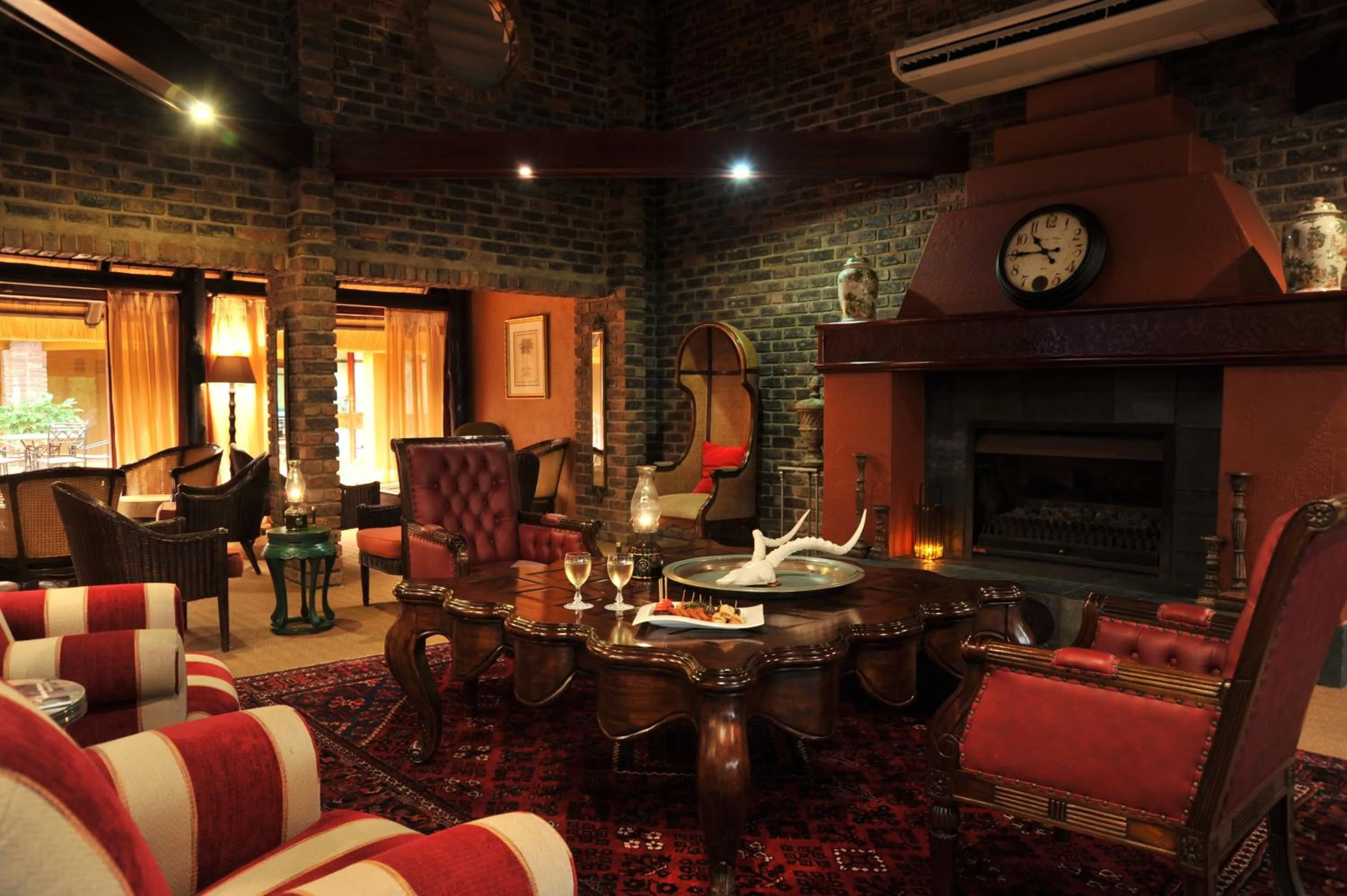 Communal lounge/ TV room in Hazyview Sun