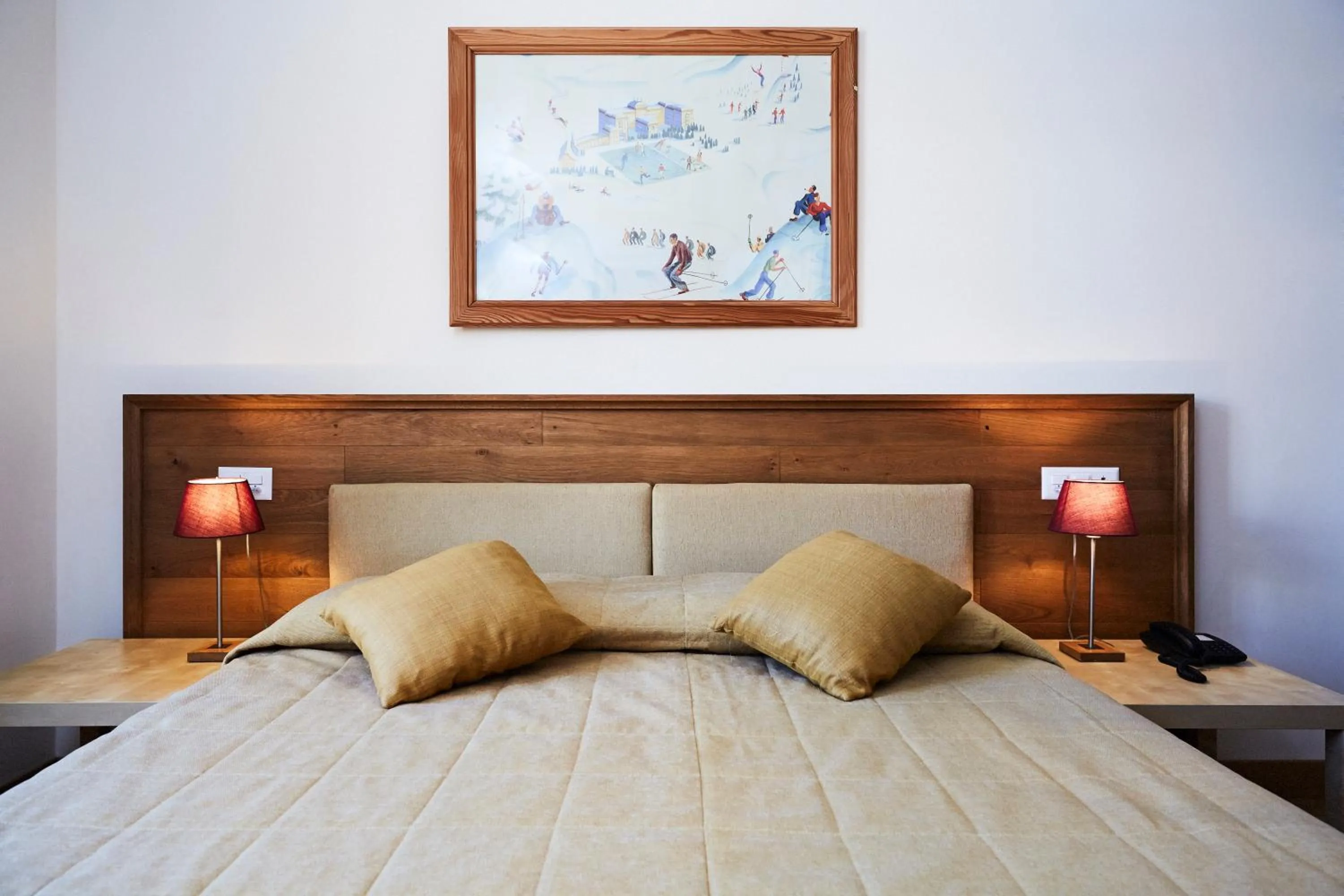 Bed in Maloja Palace Suites CO2-Neutral