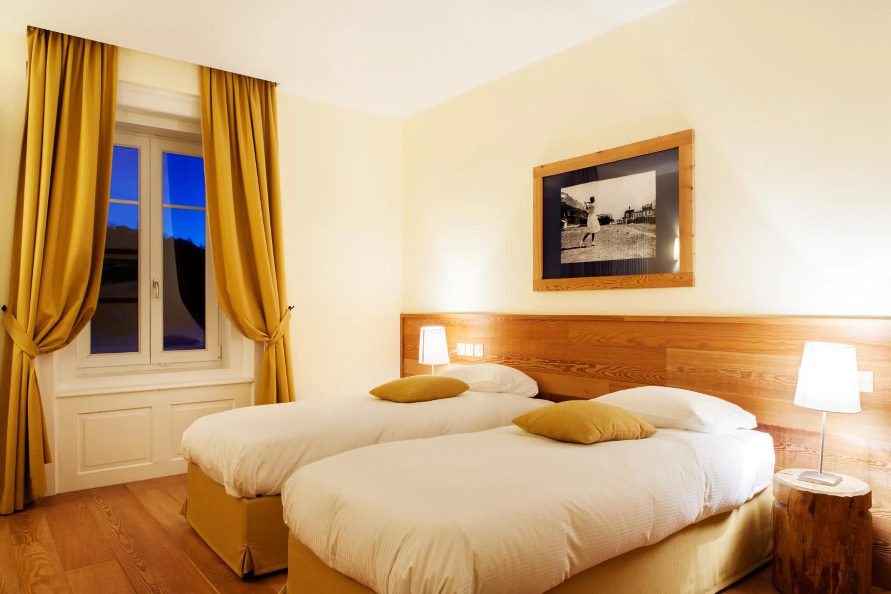 Bed in Maloja Palace Suites CO2-Neutral