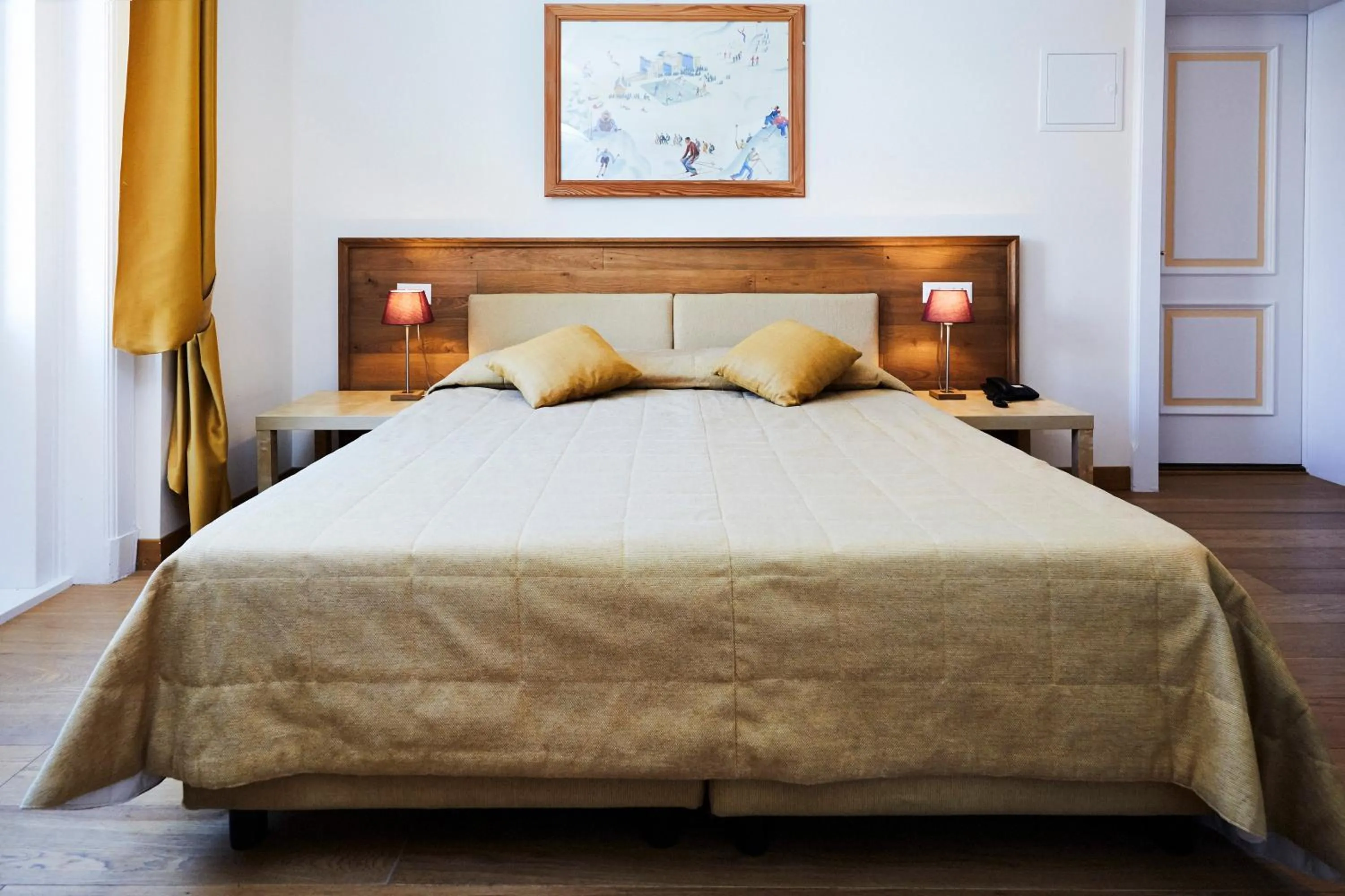 Bed in Maloja Palace Suites CO2-Neutral