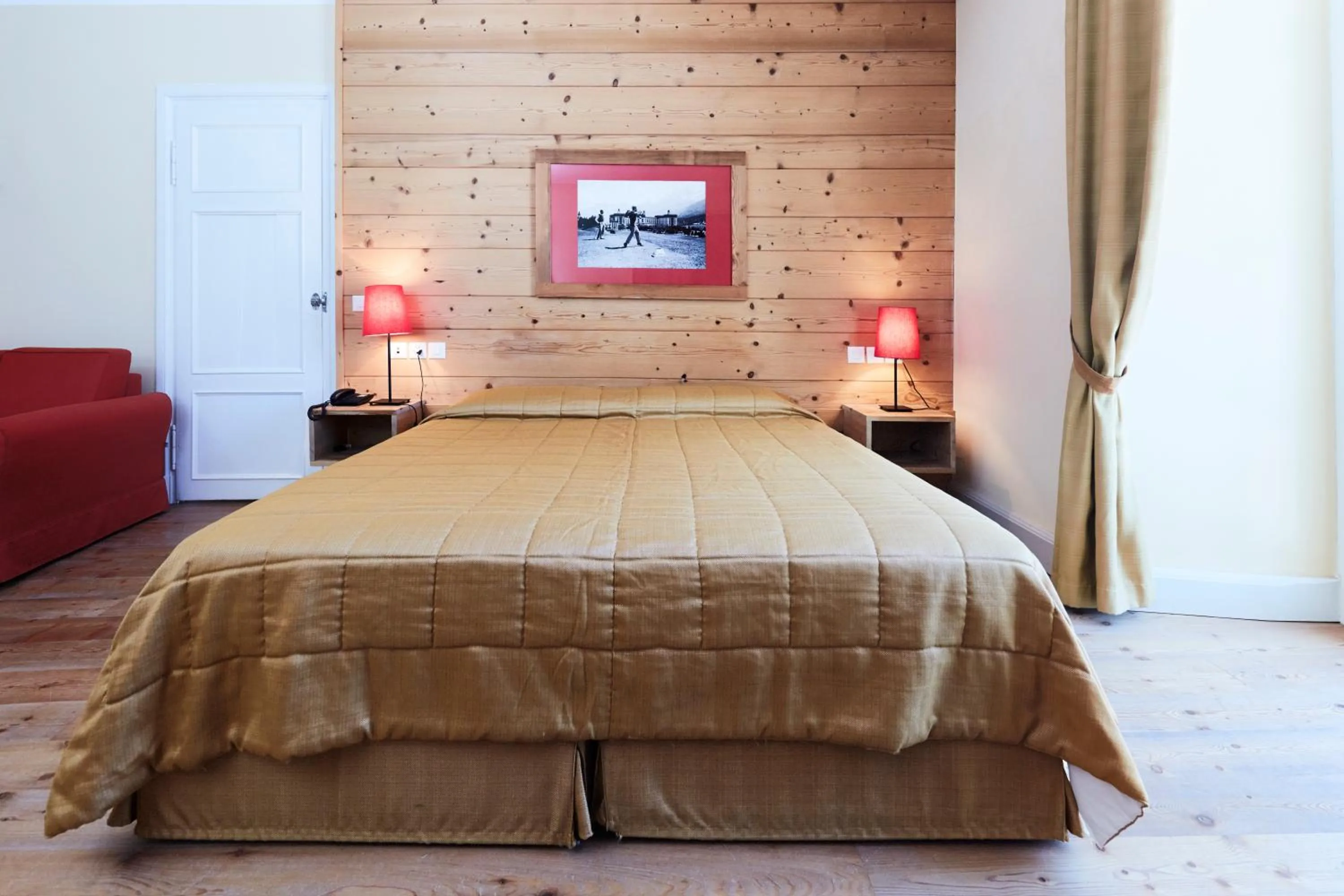 Bed in Maloja Palace Suites CO2-Neutral