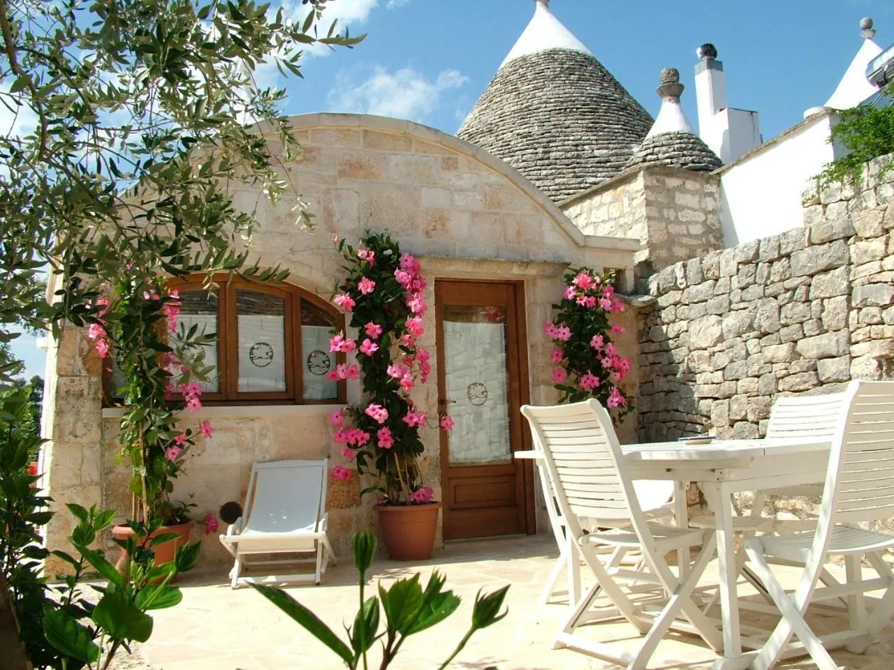 Deluxe Quadruple Room in Masseria Cappuccini