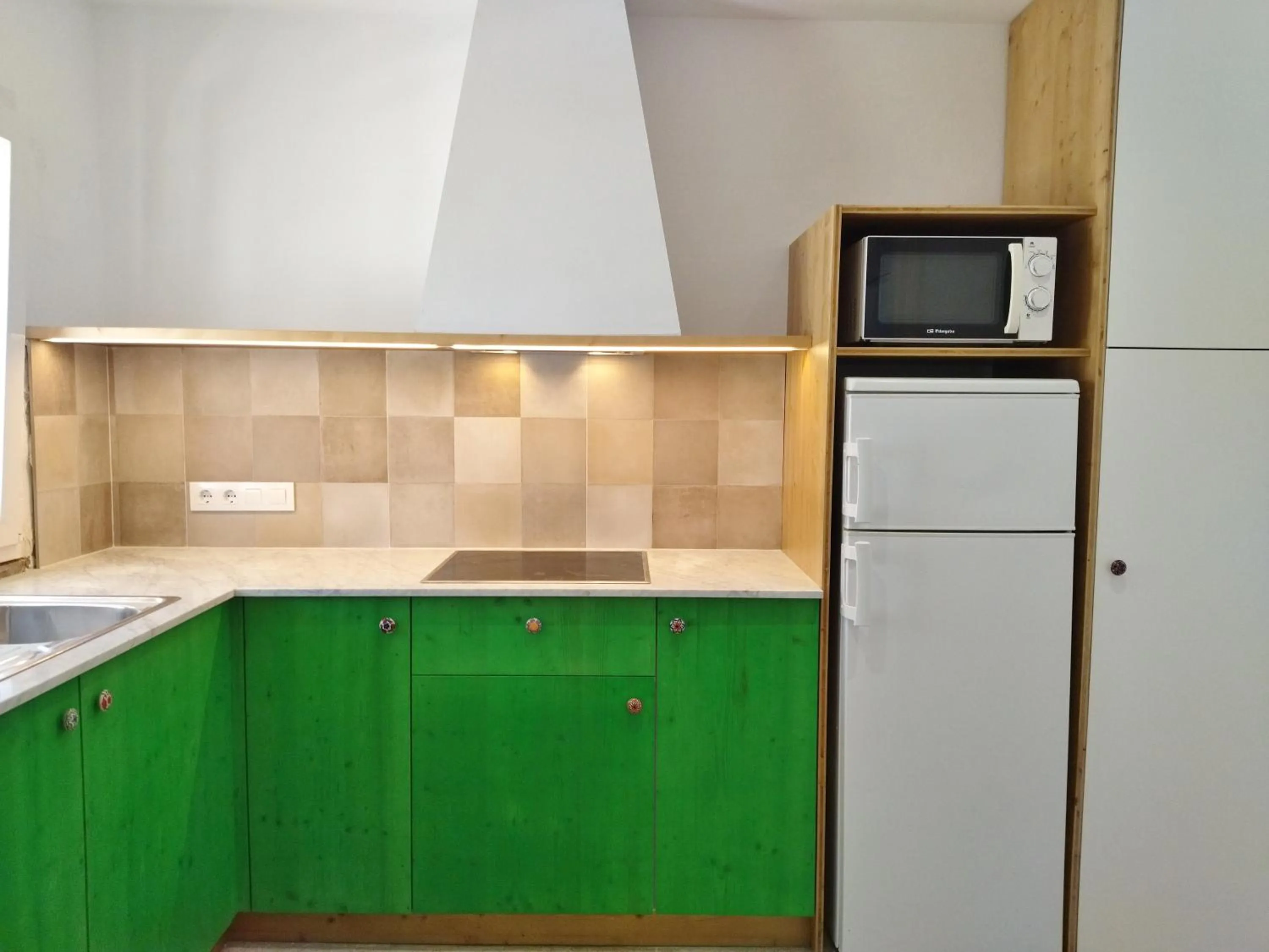 kitchen in Nure Cel Blau