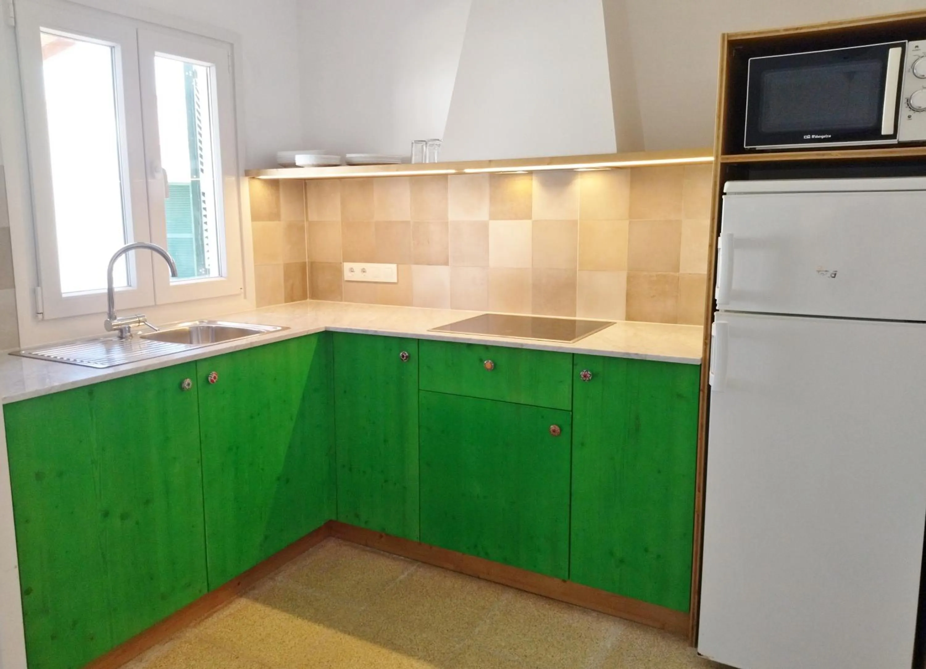 kitchen in Nure Cel Blau