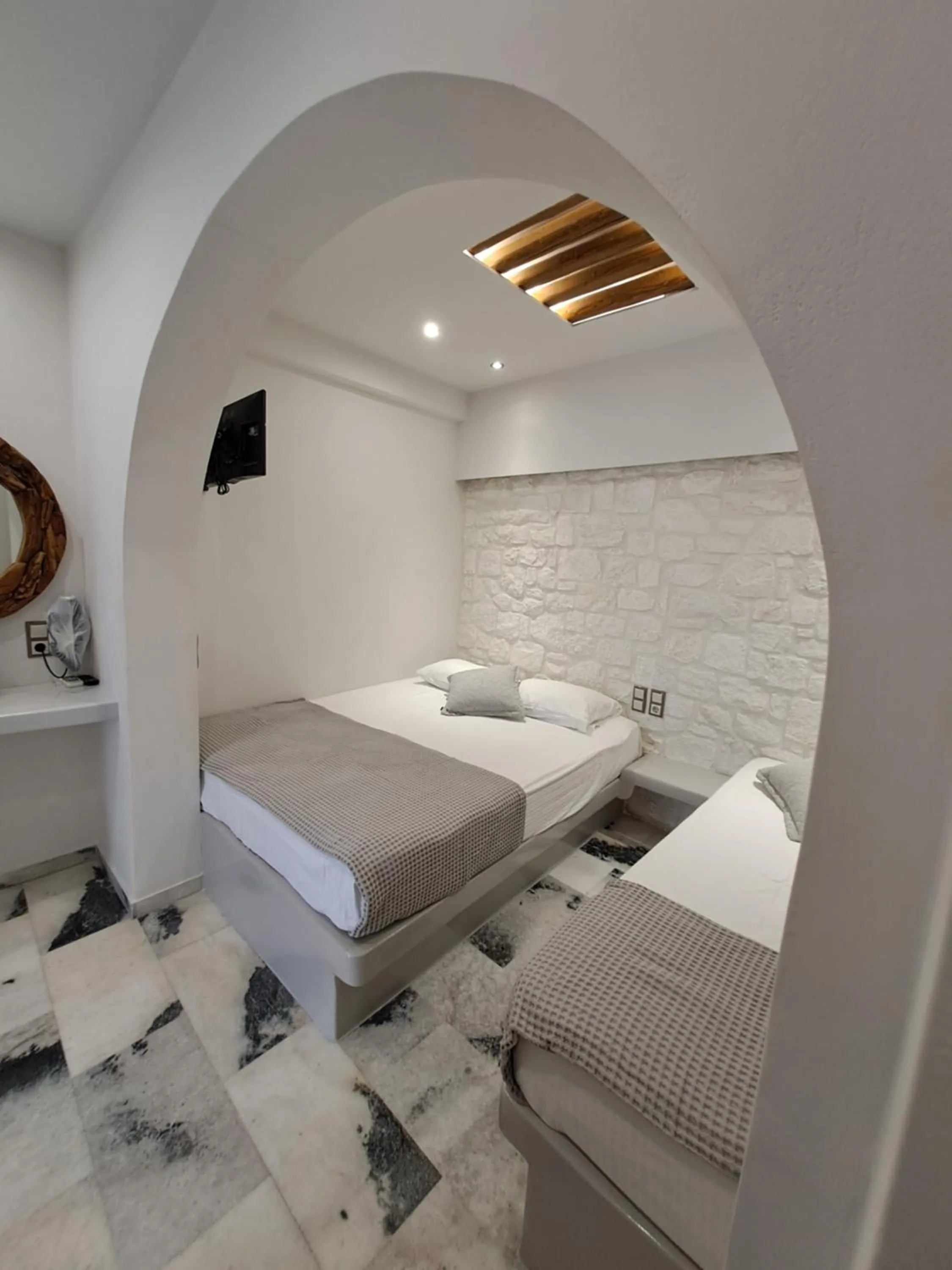 Bed in Katerina Roza Studios - Heartfelt Hospitality in the City