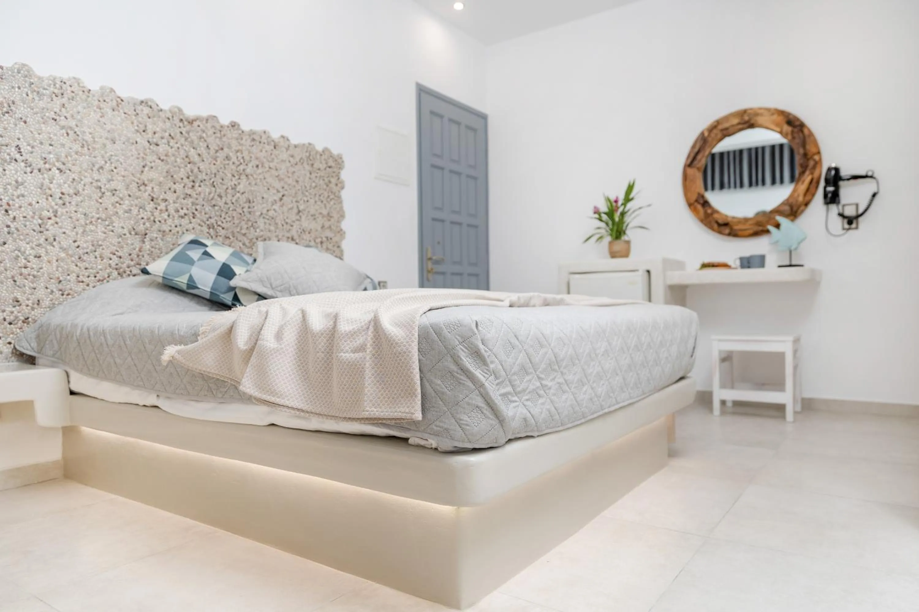 Bed in Katerina Roza Studios - Heartfelt Hospitality in the City