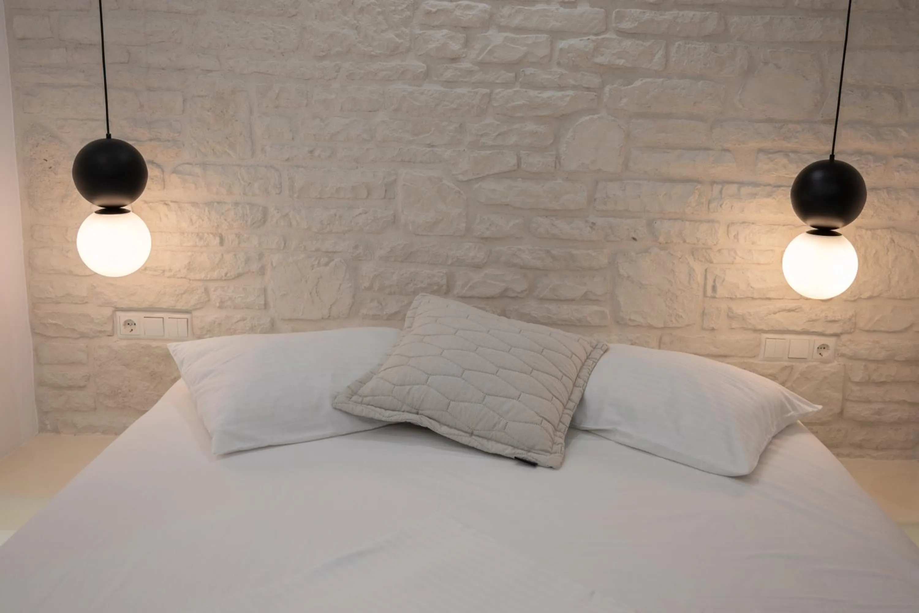 Bed in Katerina Roza Studios - Heartfelt Hospitality in the City