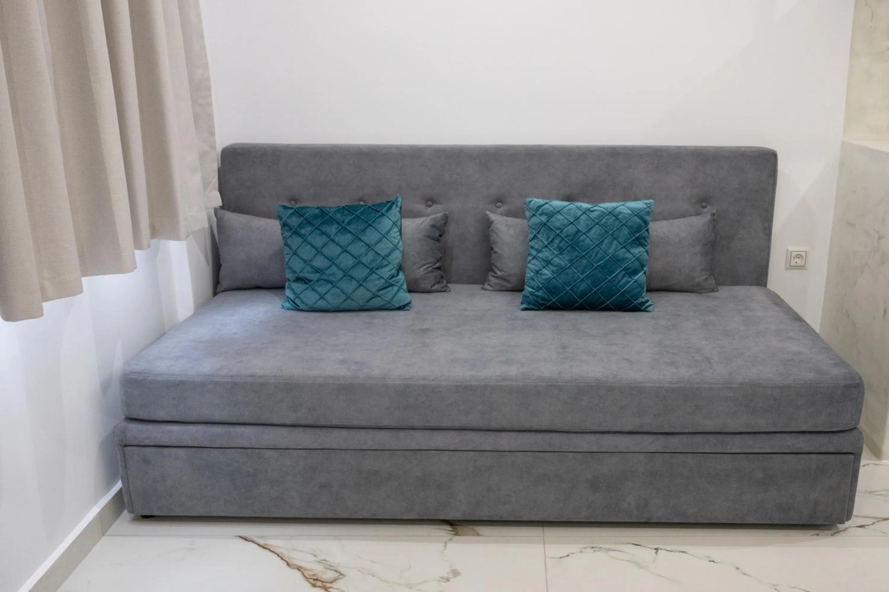 Bed in Katerina Roza Studios - Heartfelt Hospitality in the City