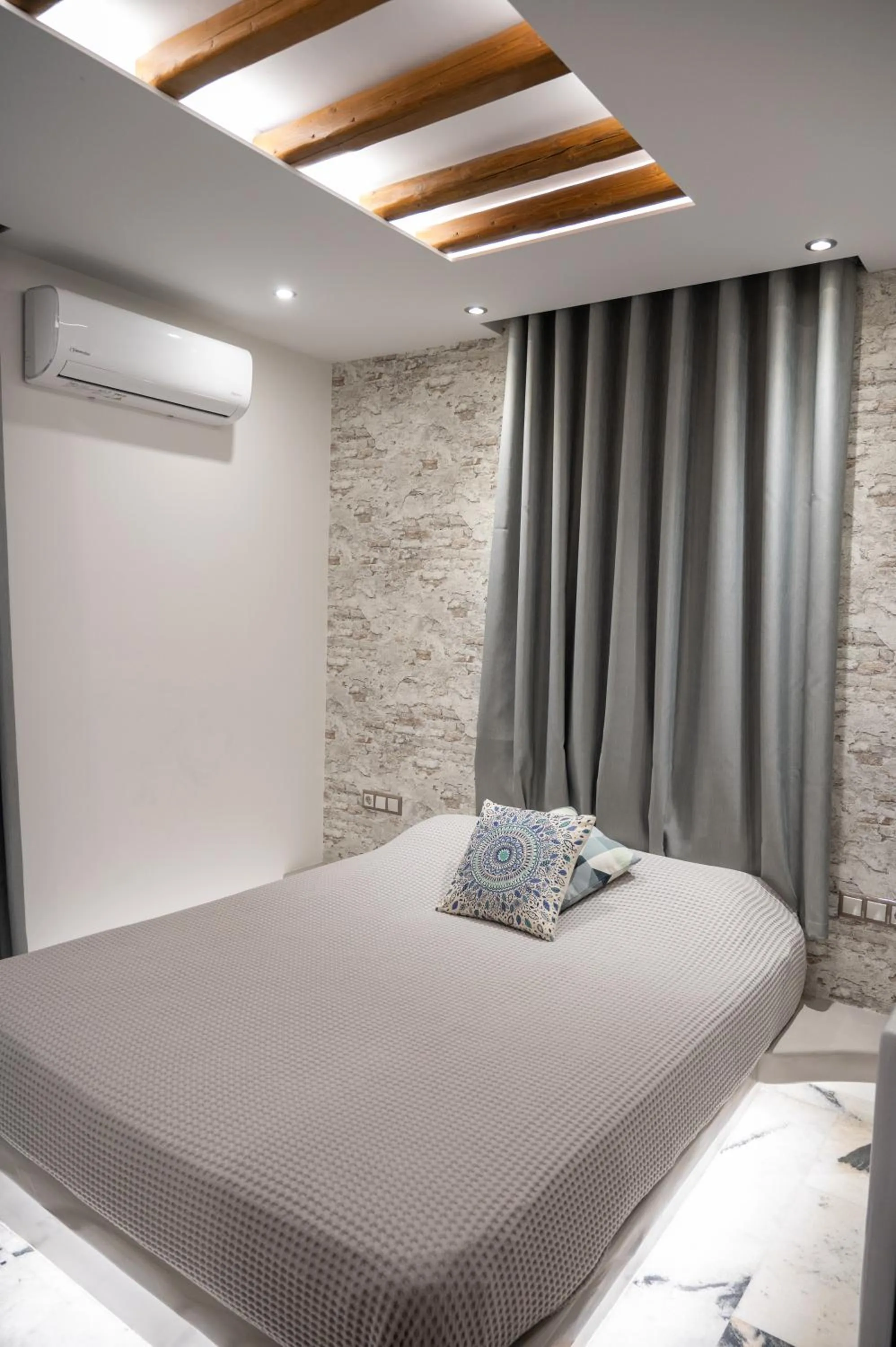 Bed in Katerina Roza Studios - Heartfelt Hospitality in the City