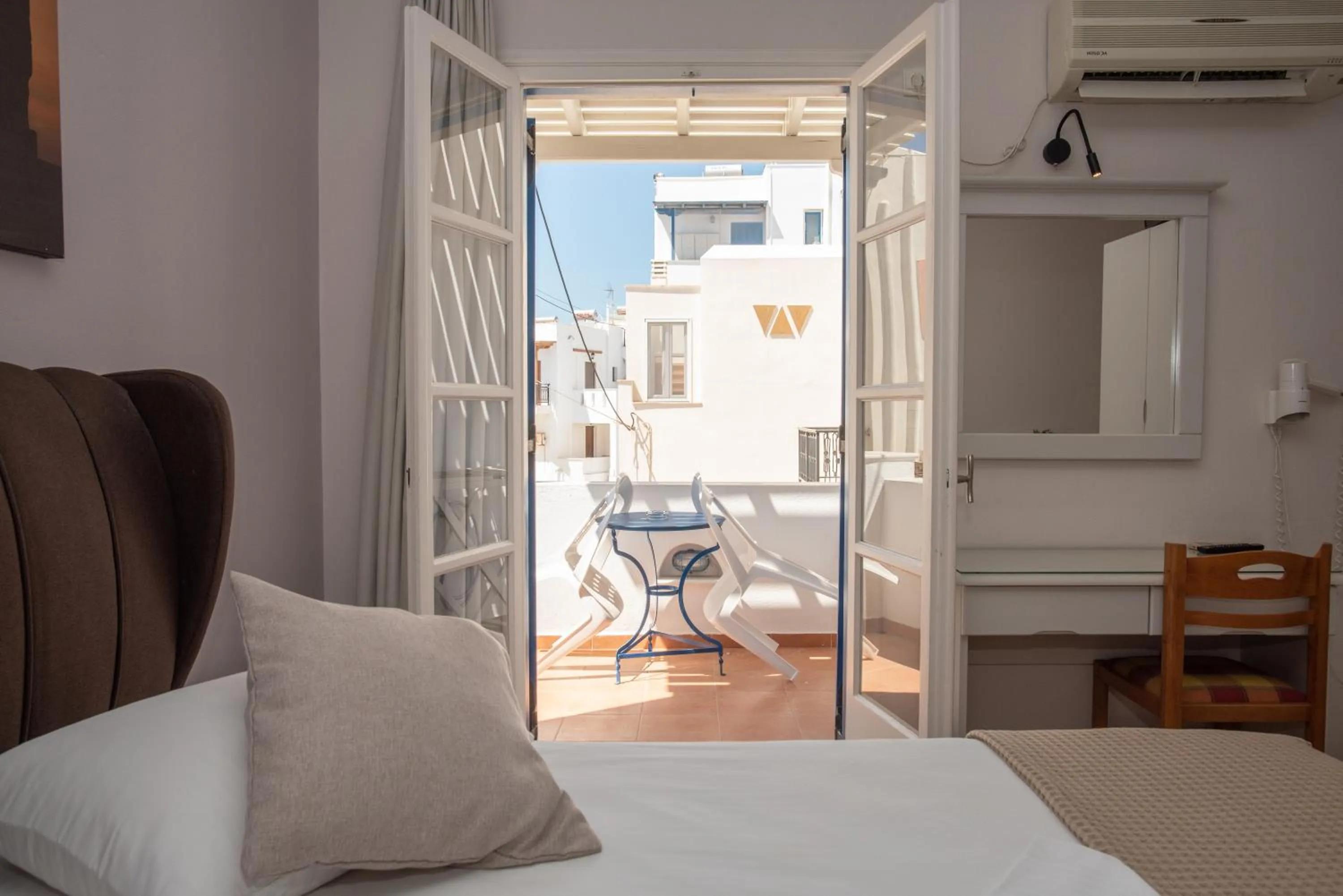 Bed in Katerina Roza Studios - Heartfelt Hospitality in the City