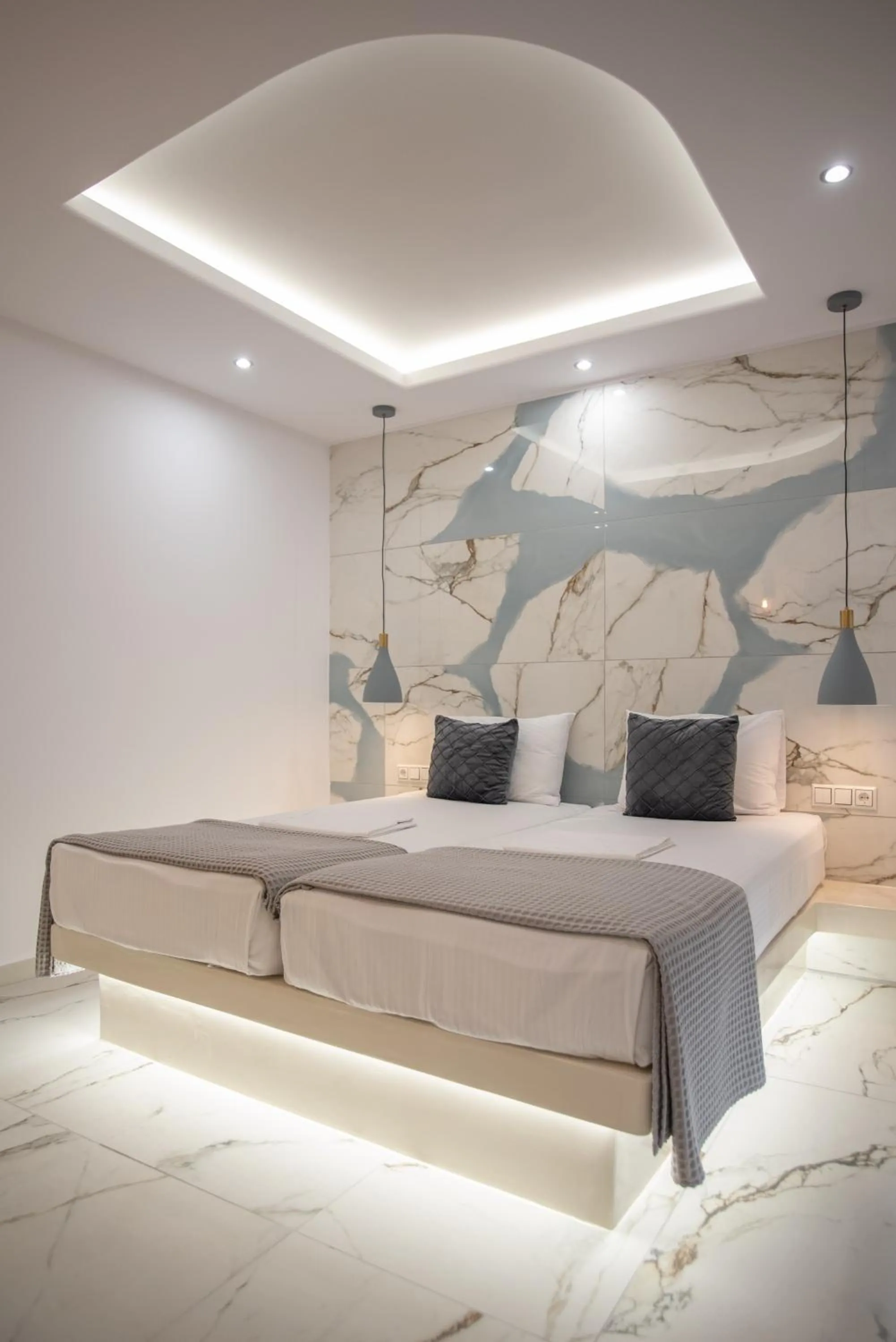 Bed in Katerina Roza Studios - Heartfelt Hospitality in the City