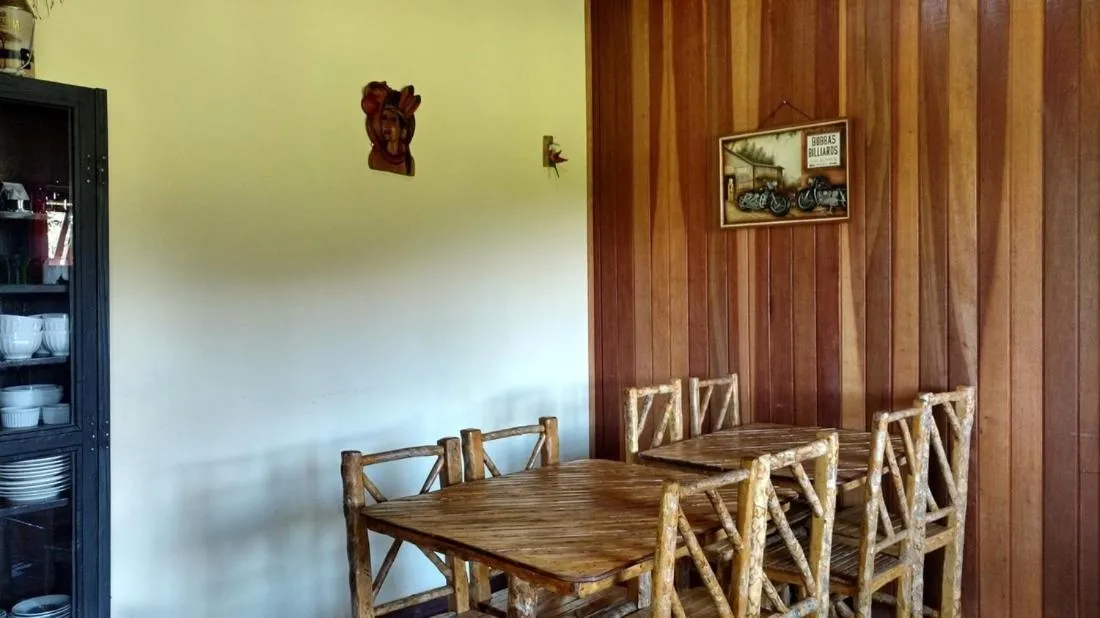 Communal lounge/ TV room in Pousada Casa Fazenda do Rio