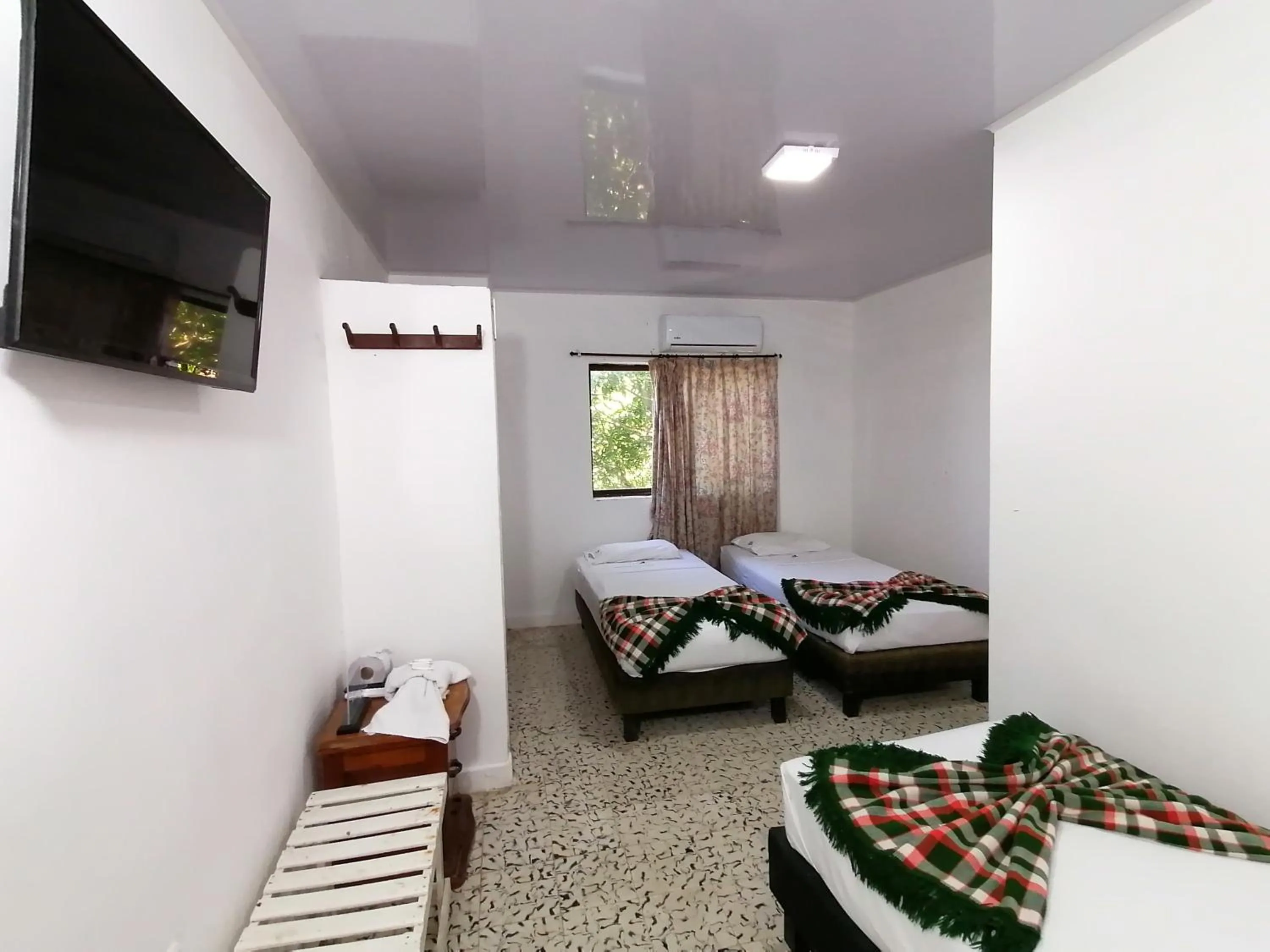 Bed in Hotel Montecarlo Beach