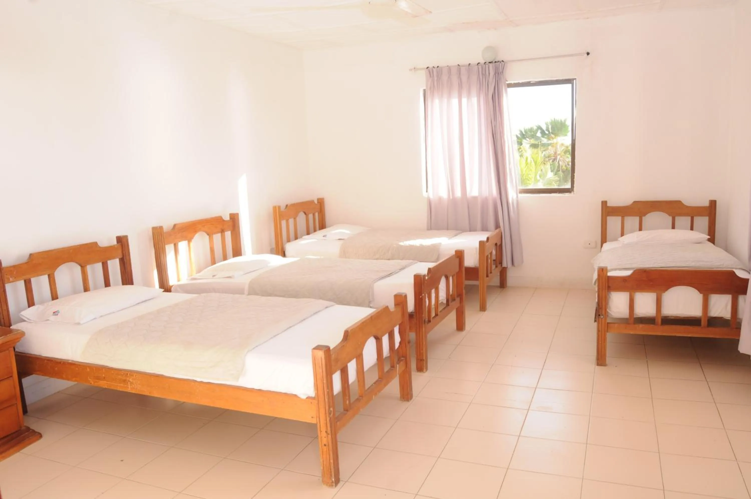 Bed in Hotel Montecarlo Beach