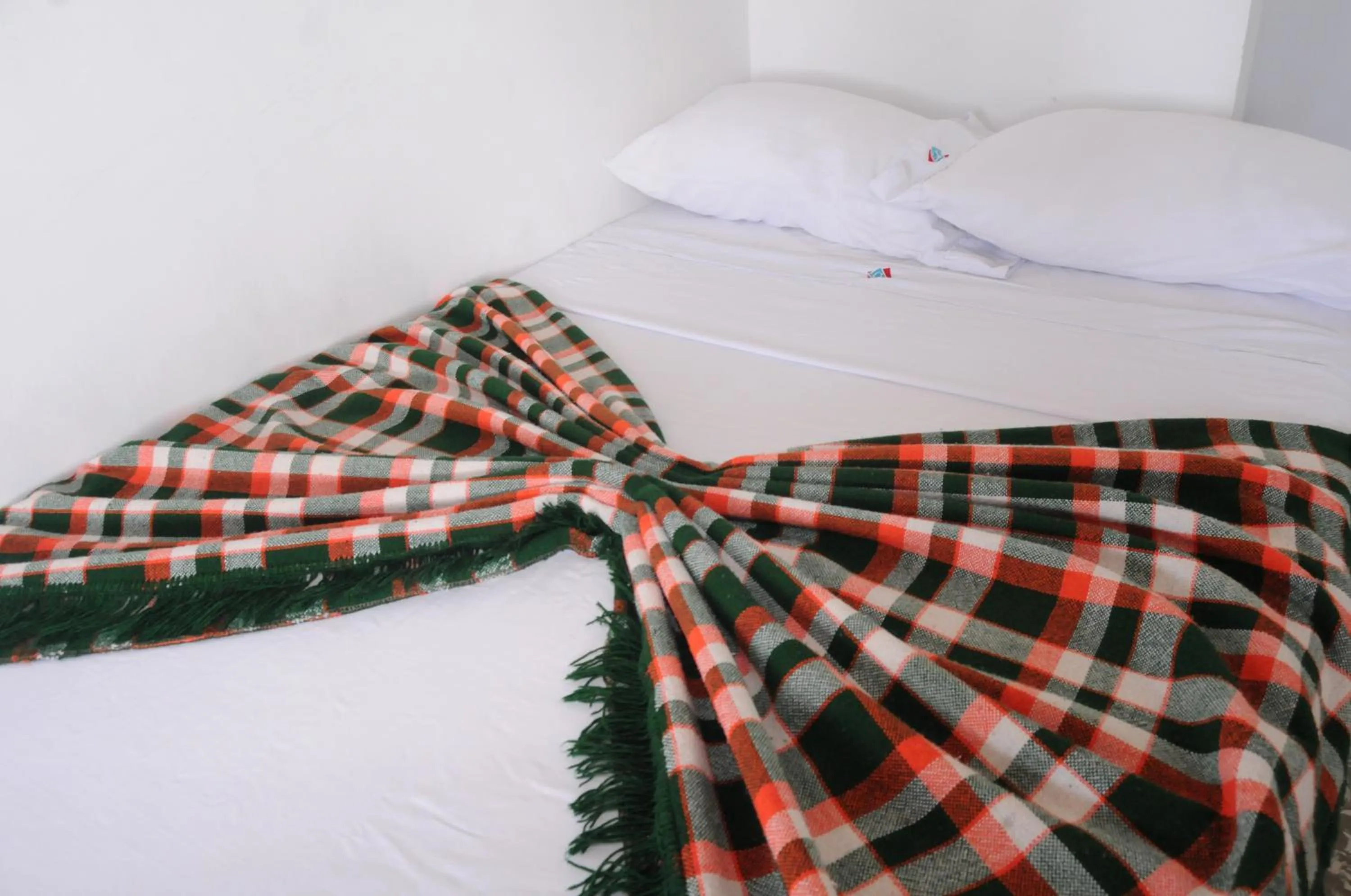 Bed in Hotel Montecarlo Beach