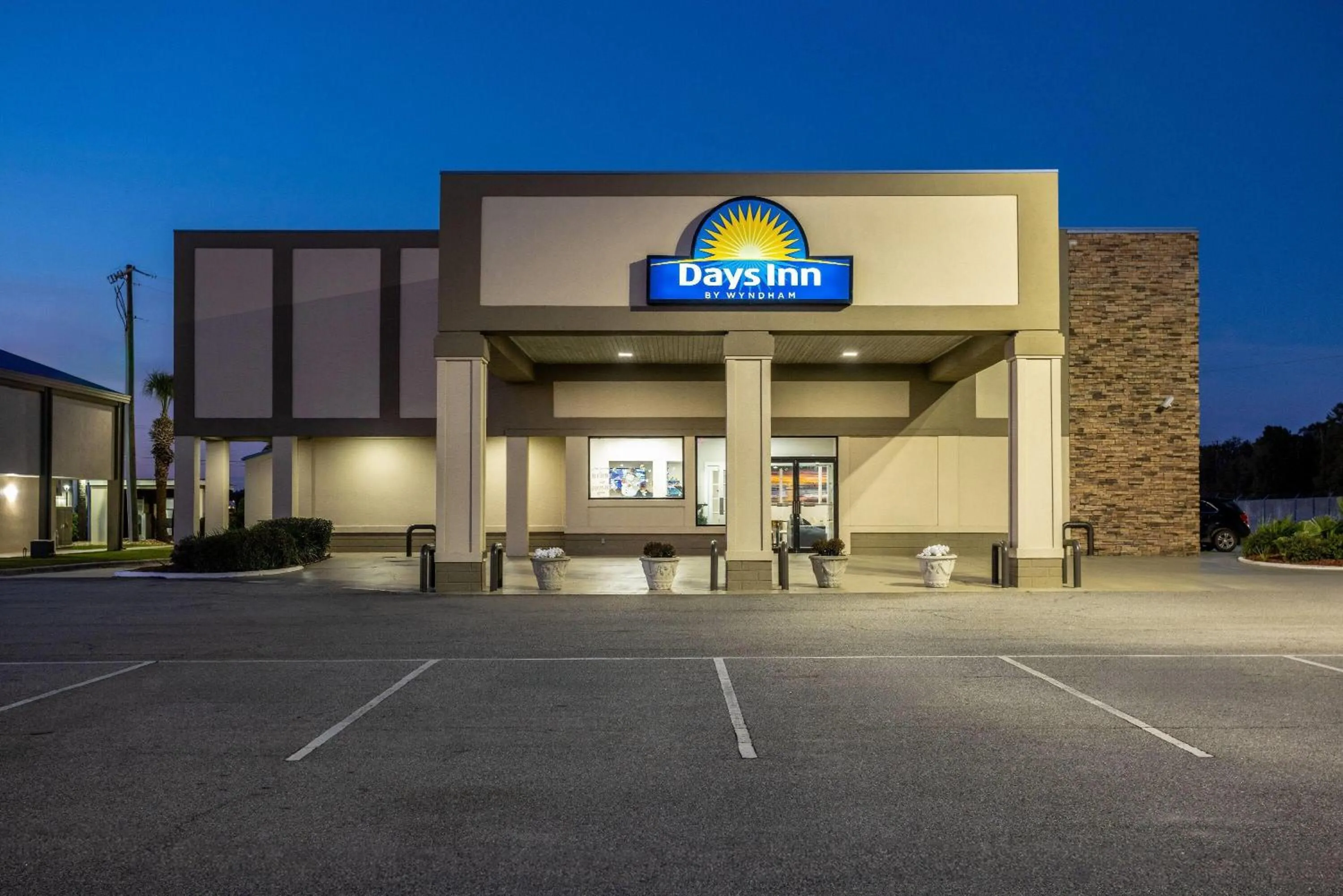 Property building in Days Inn by Wyndham Adel I-75