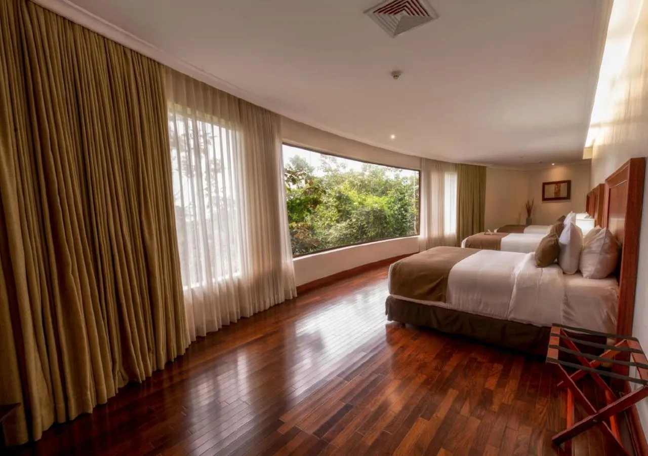 Photo of the whole room, Bed in Hillary Nature Resort & Spa All Inclusive
