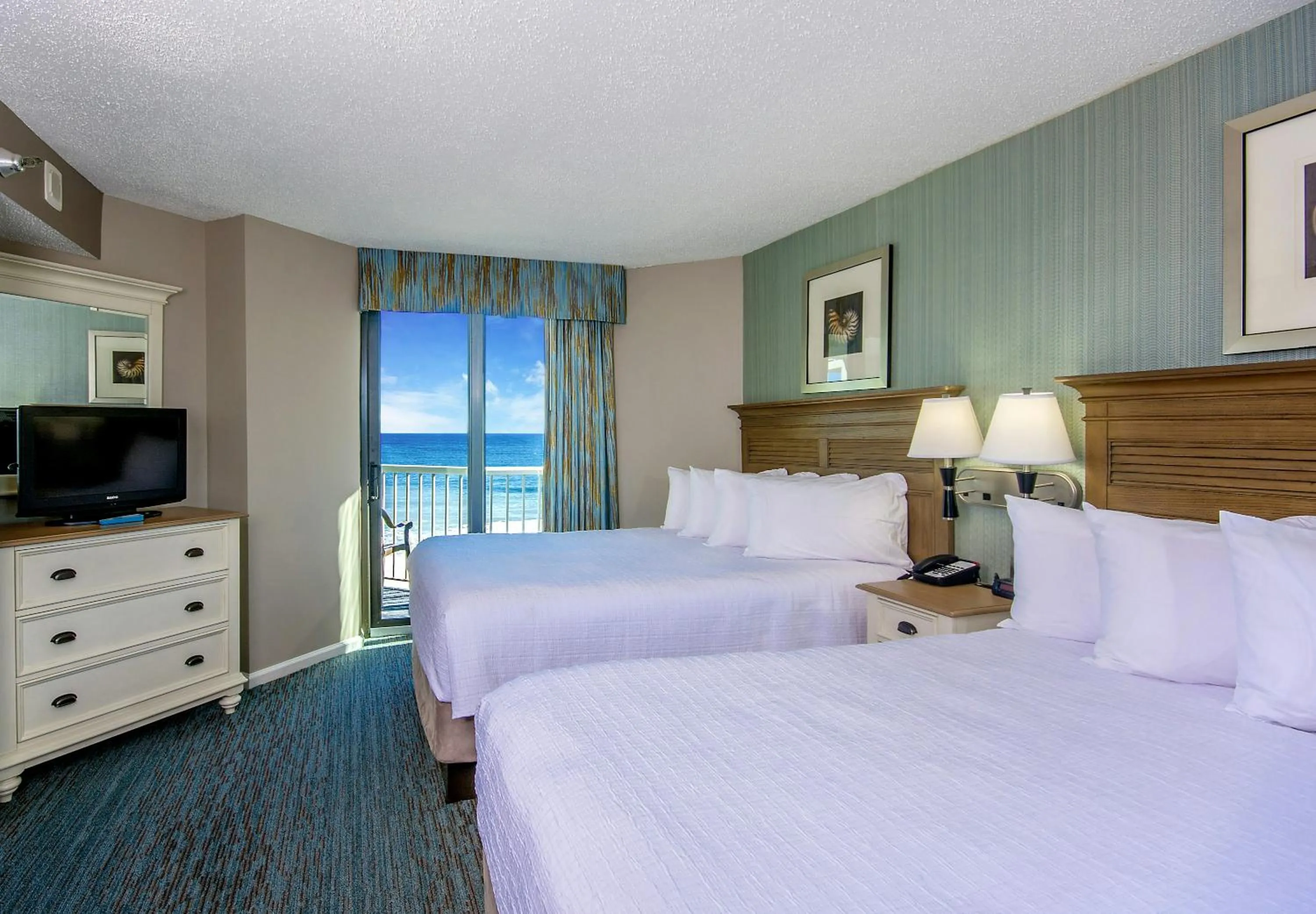 Bedroom, Bed in The Strand - A Boutique Resort