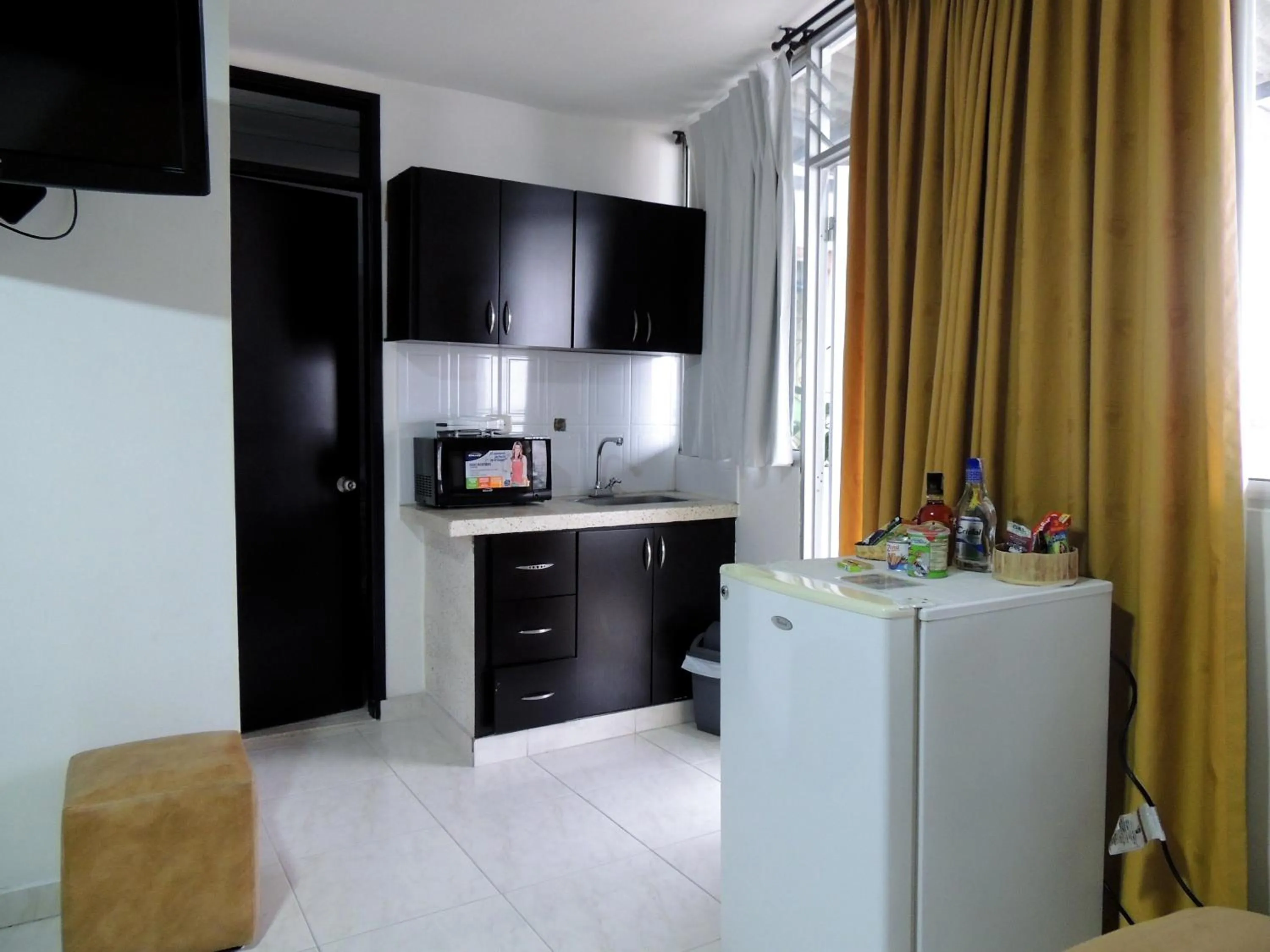 Kitchen or kitchenette in Hotel San Martin