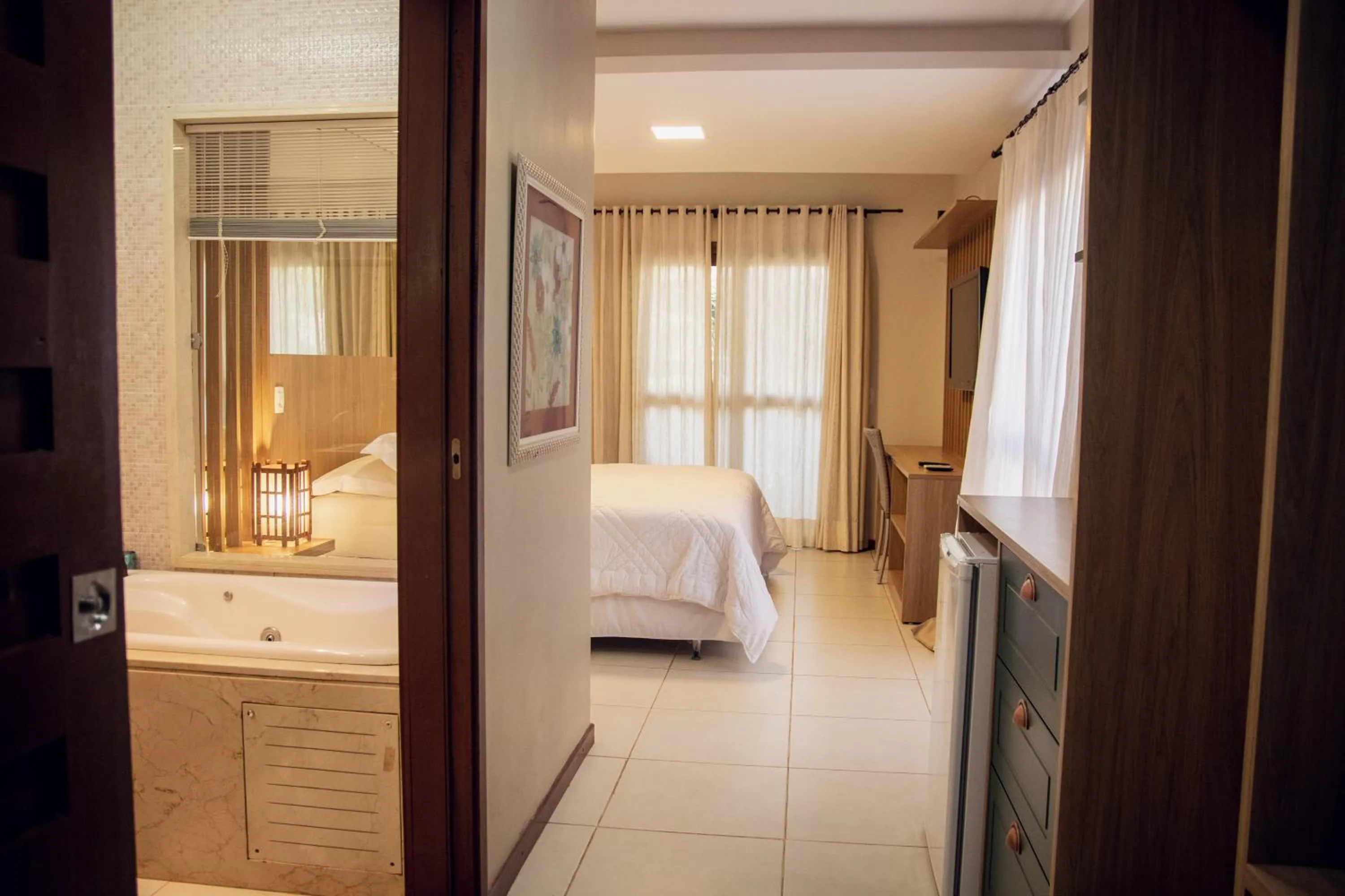 Bed in Kanaloa Pousada