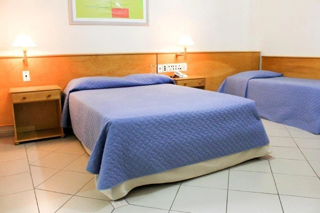 Bed in Jaguary Hotel Sumaré