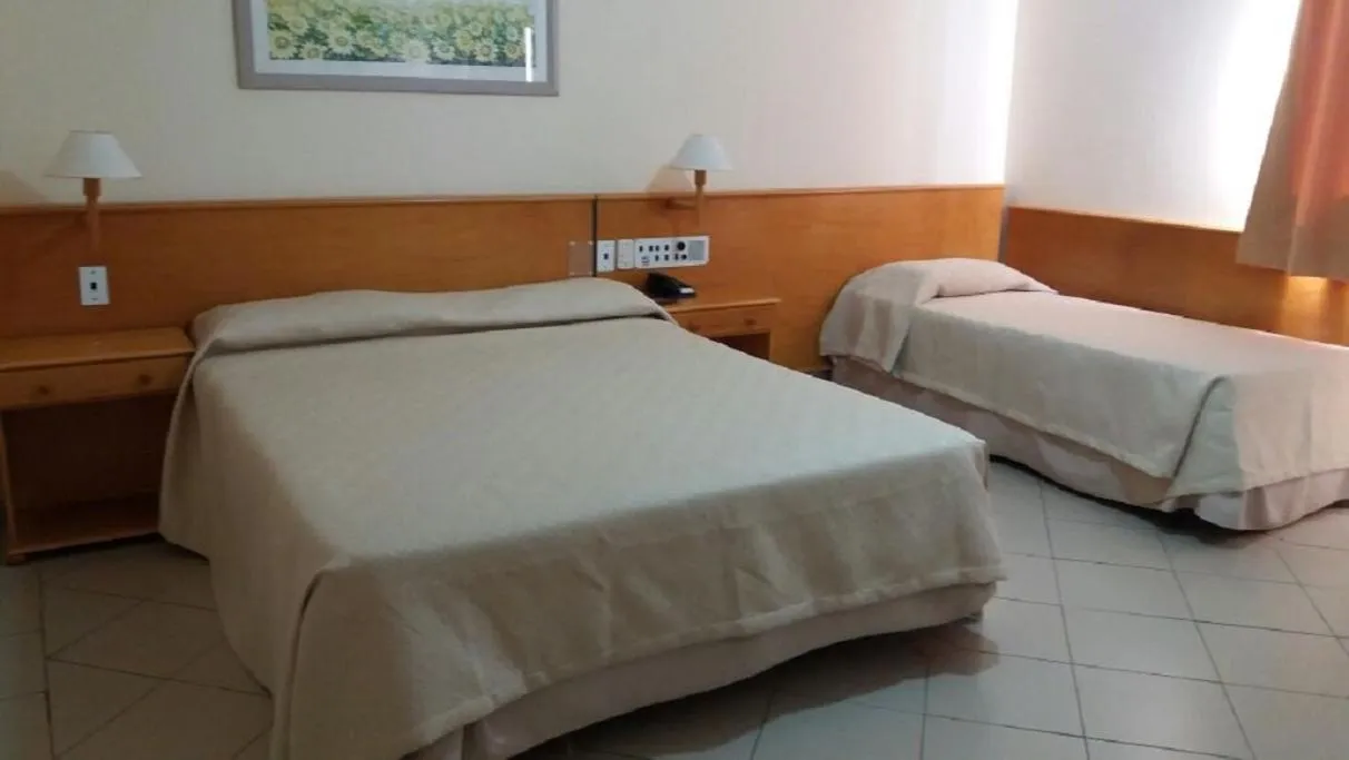 Bed in Jaguary Hotel Sumaré