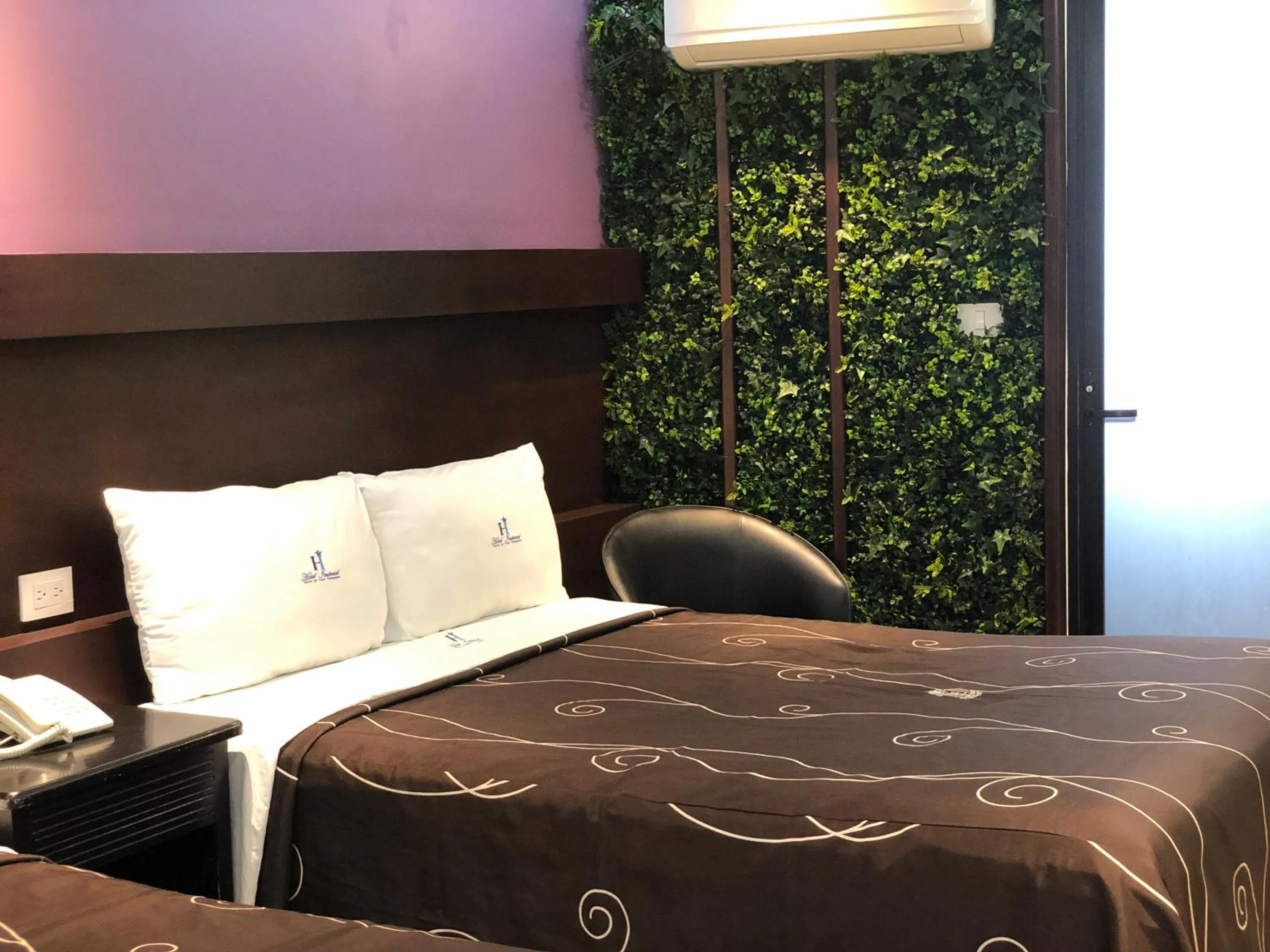 air conditioner, Bed in Hotel Imperial