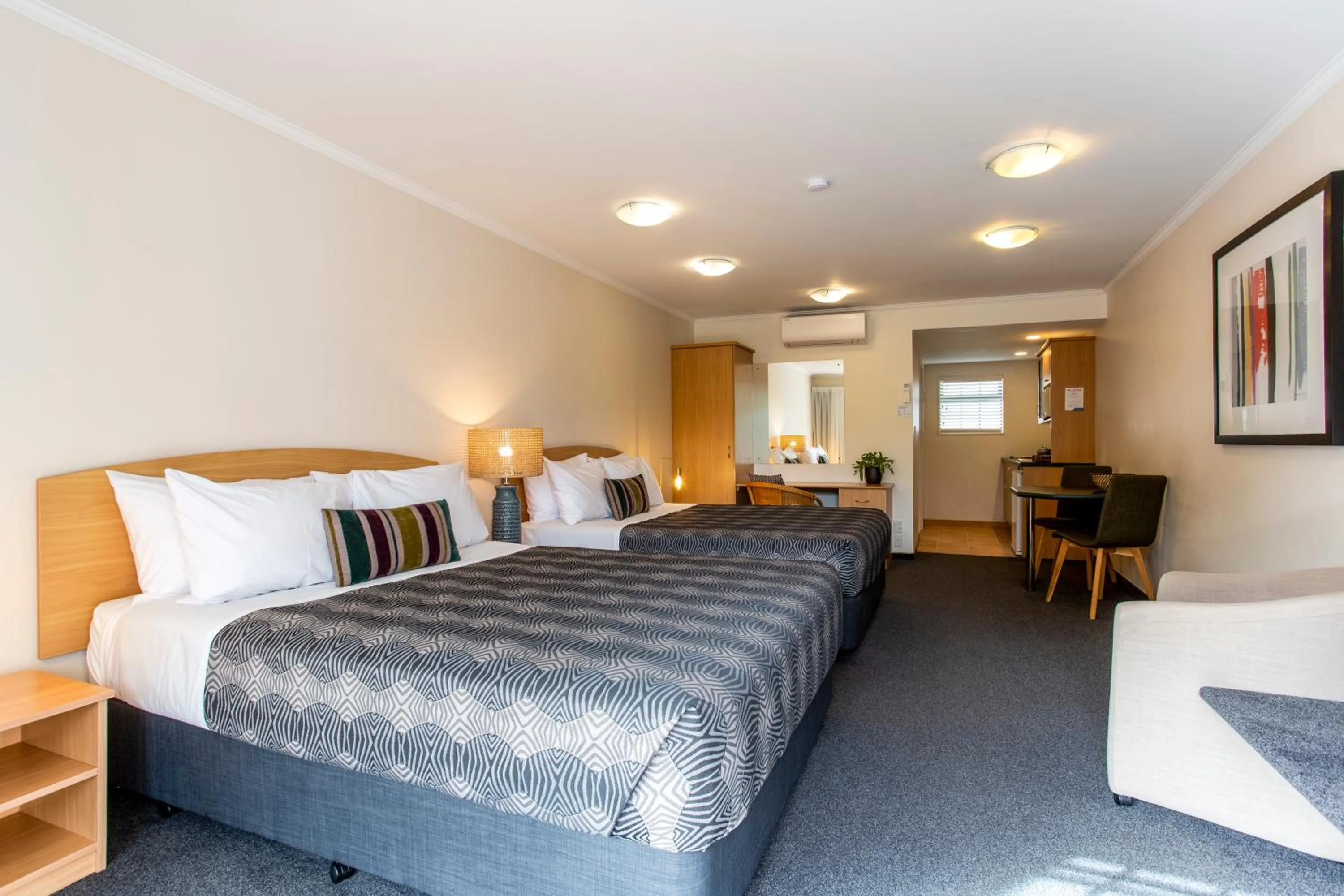 Bed in Greenlane Manor Motel