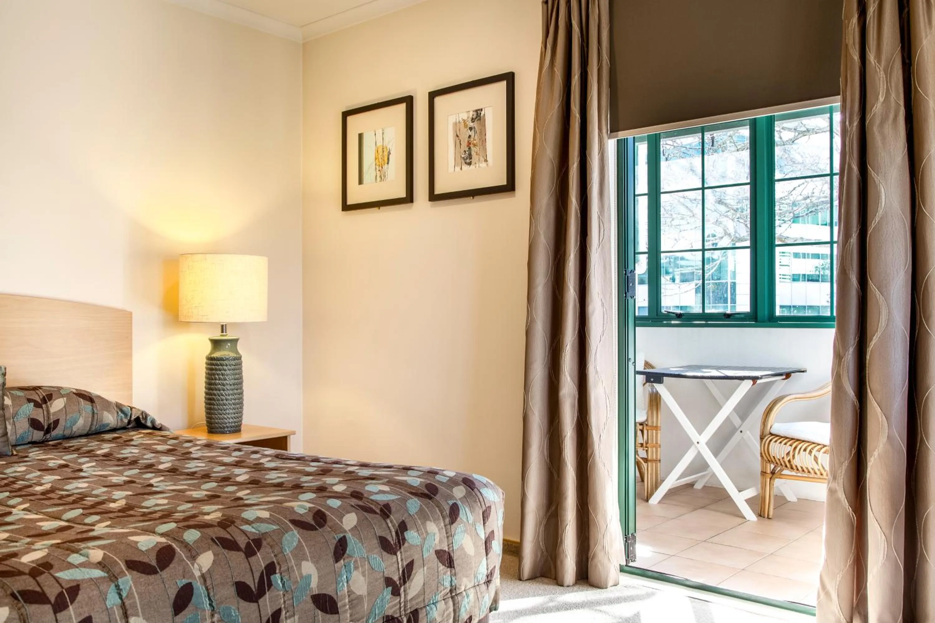 Bed in Greenlane Manor Motel