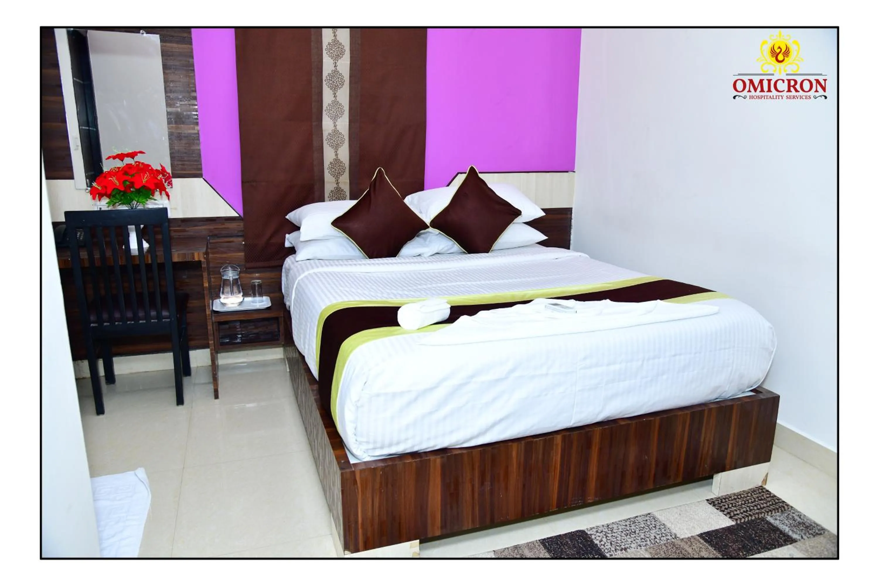 Bed in Hotel Omicron 1 BHK Studio room