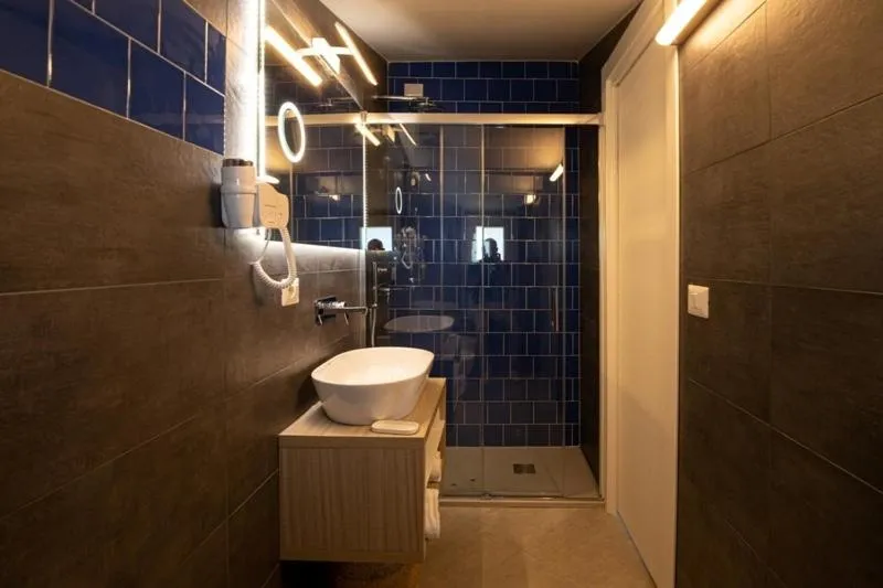 Bathroom in Hotel La Sorgente HS