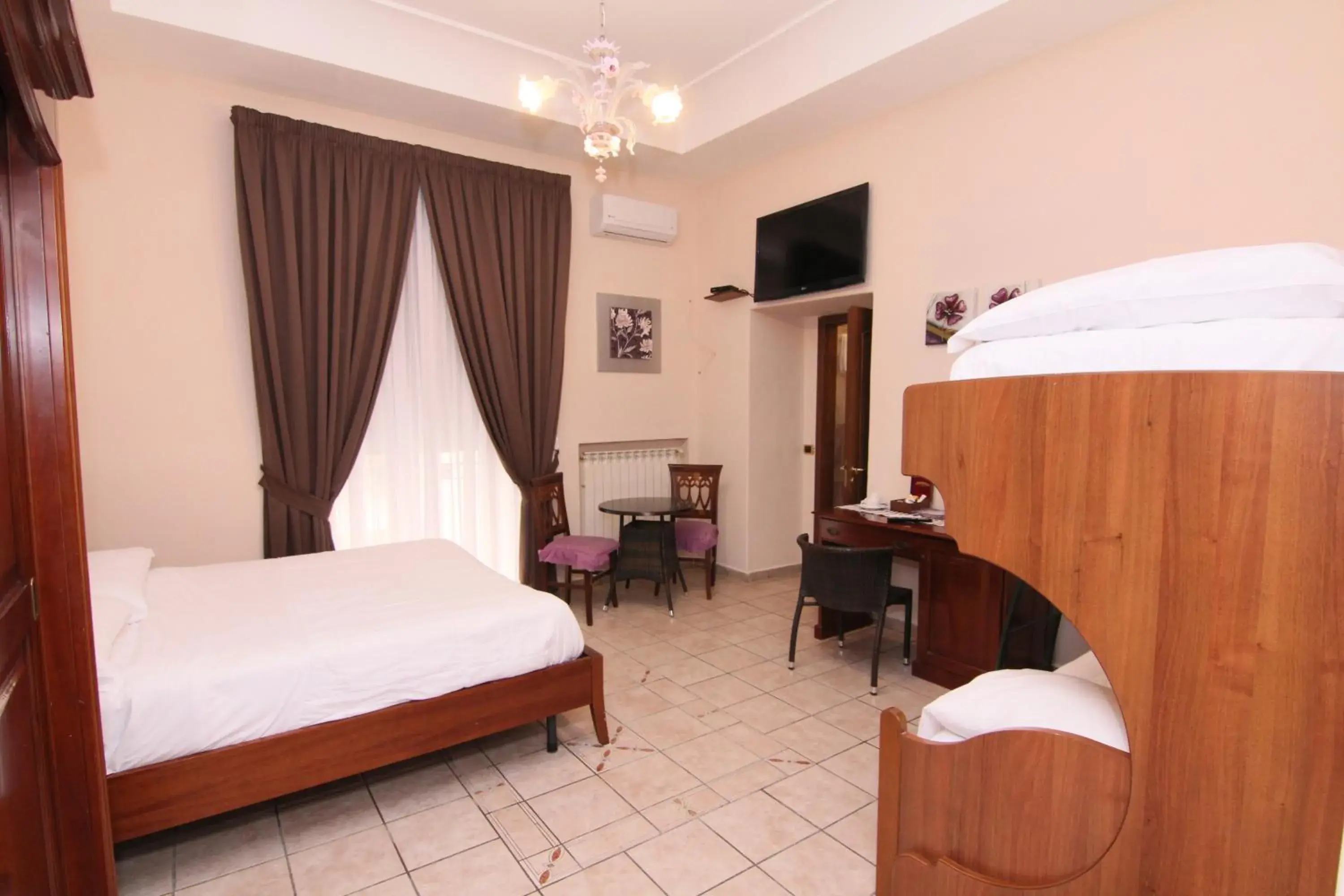 Quadruple Room in B&B Del Corso Quadruple Room in B&B Del Corso