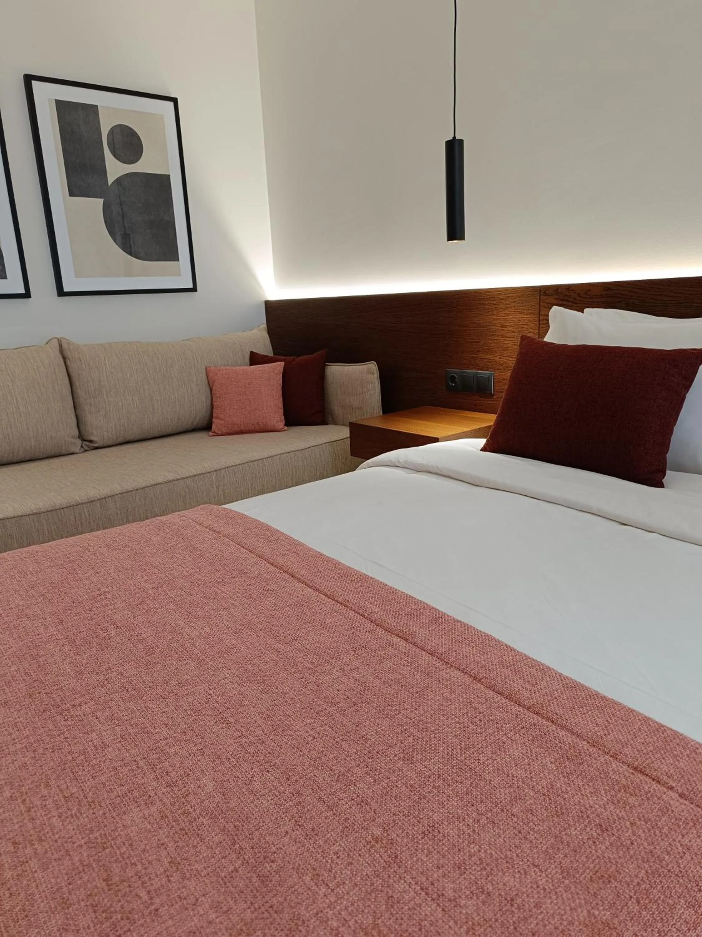 Seating area, Bed in Maison Hotel