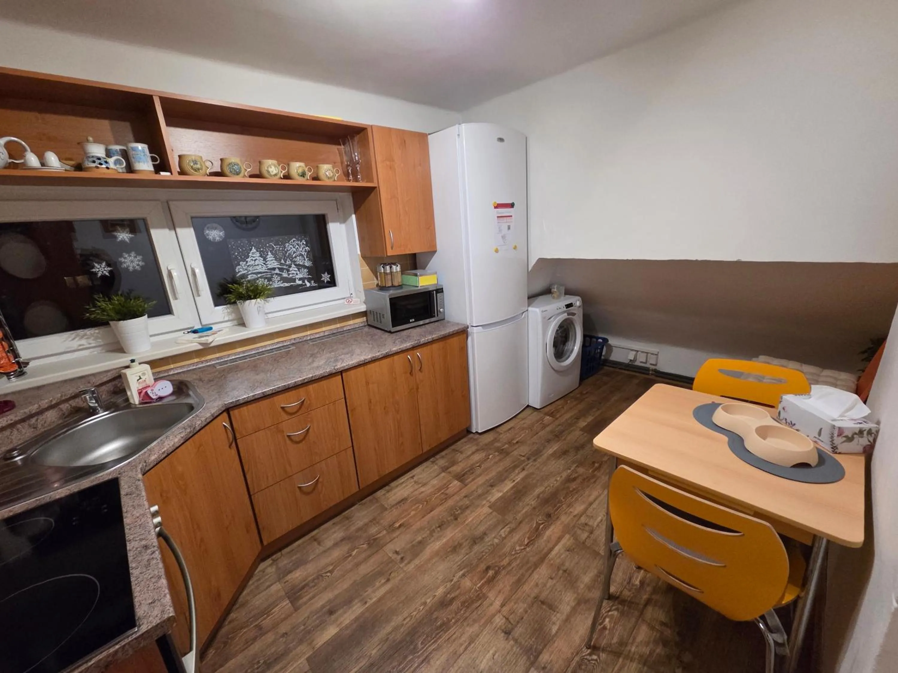 Kitchen or kitchenette in Apartmány U Červeného stromu
