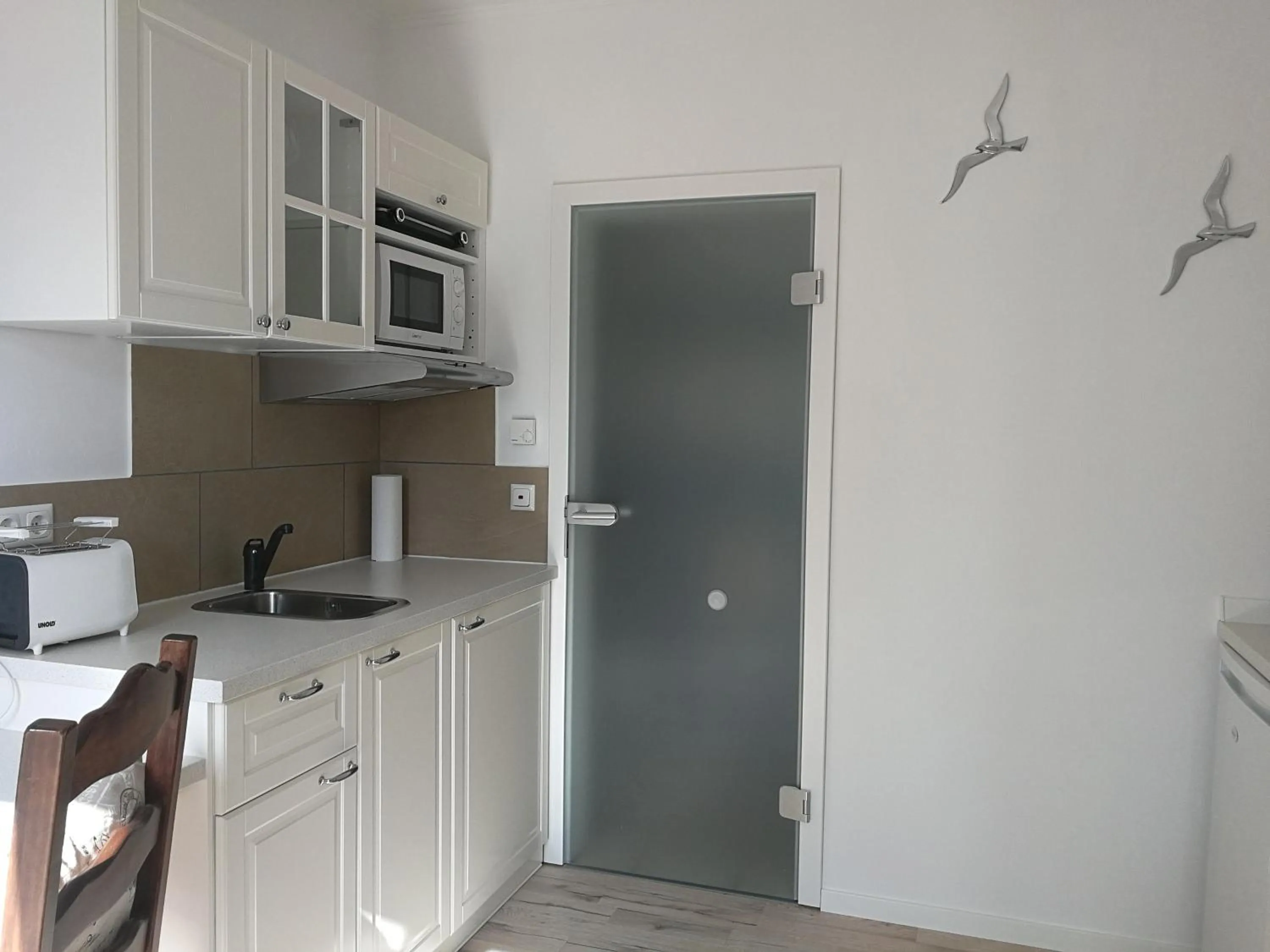 Kitchen or kitchenette in Apartmenthaus in Walle