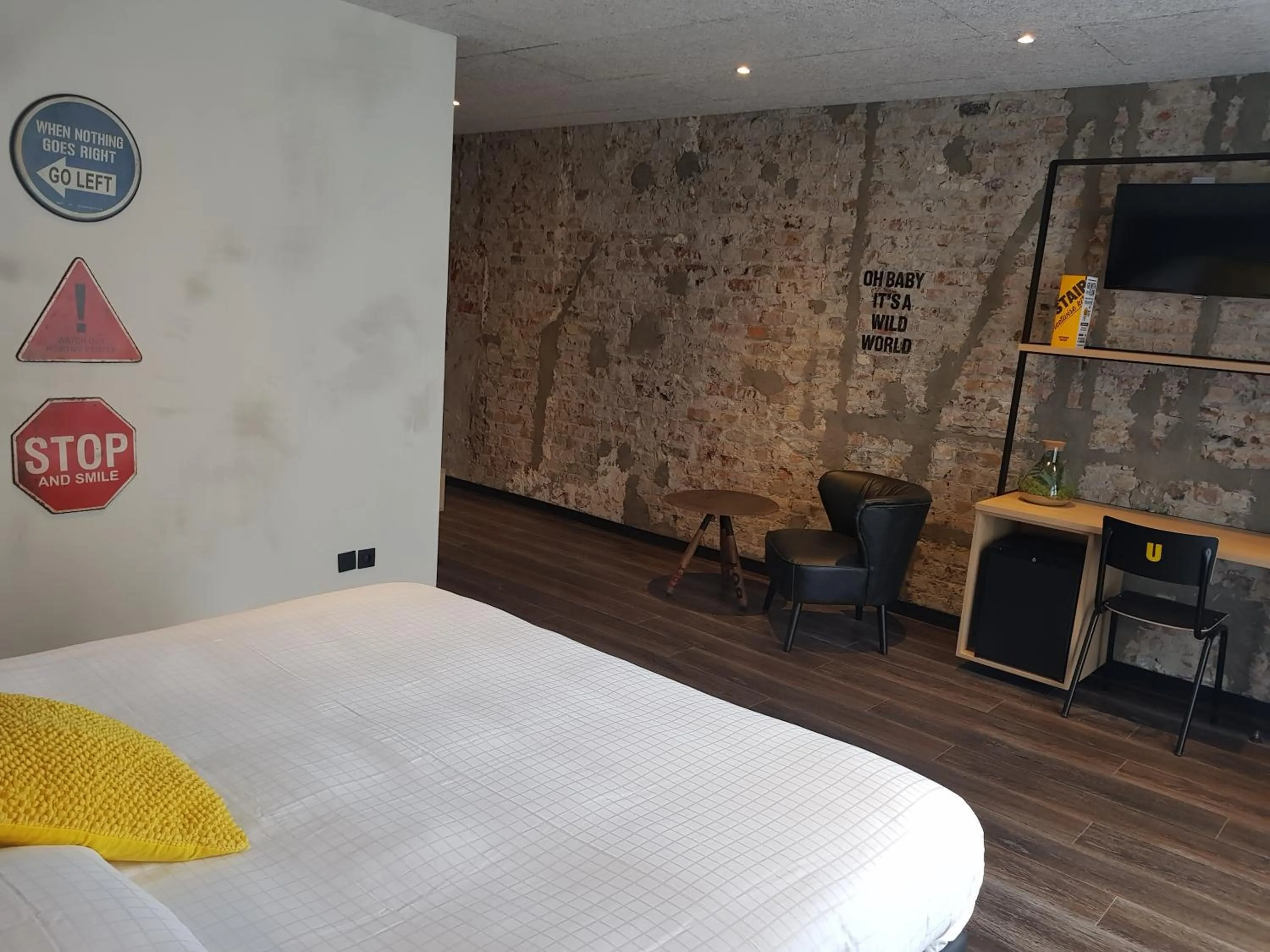 Bed in Upstairs Hotel