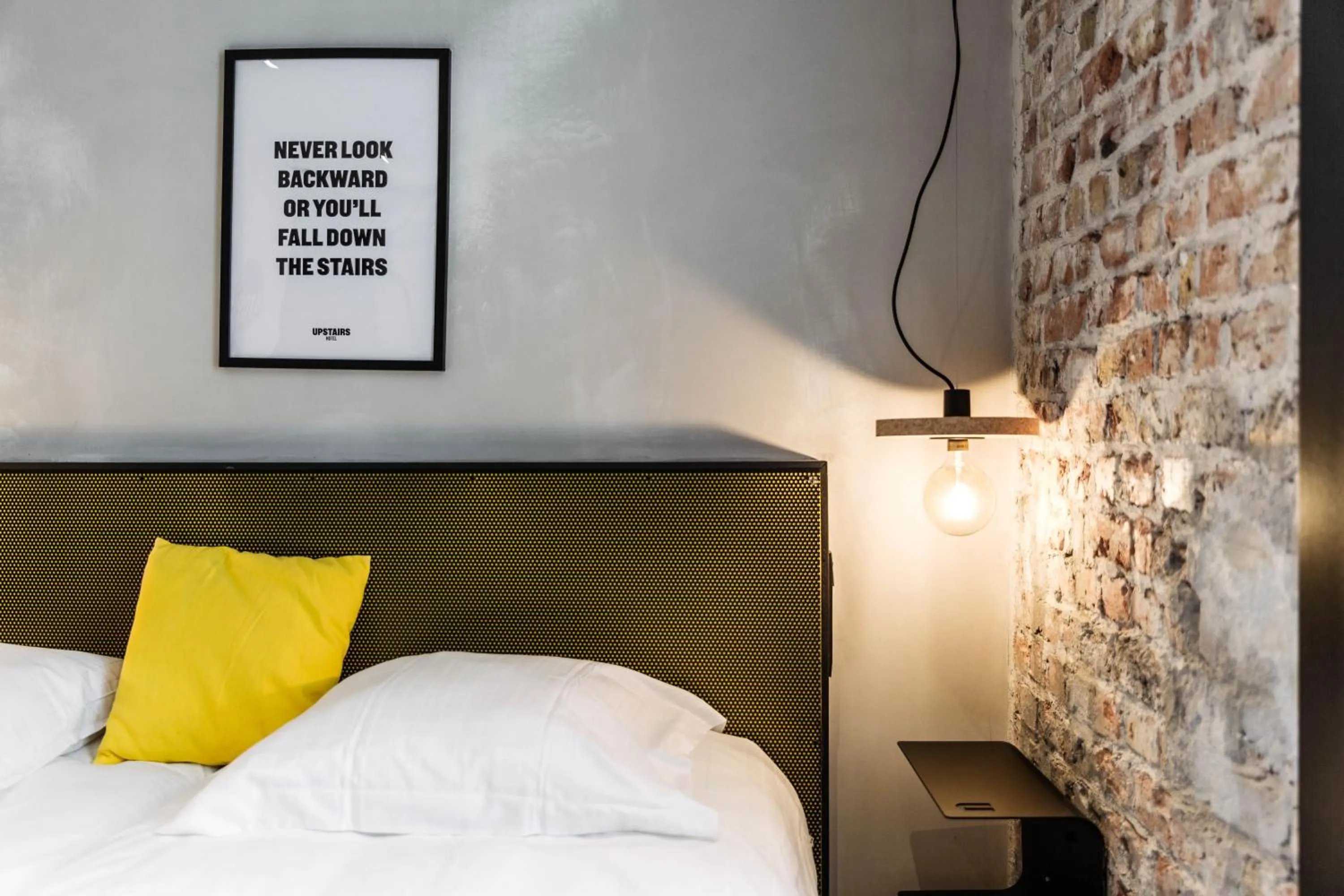 Bed in Upstairs Hotel